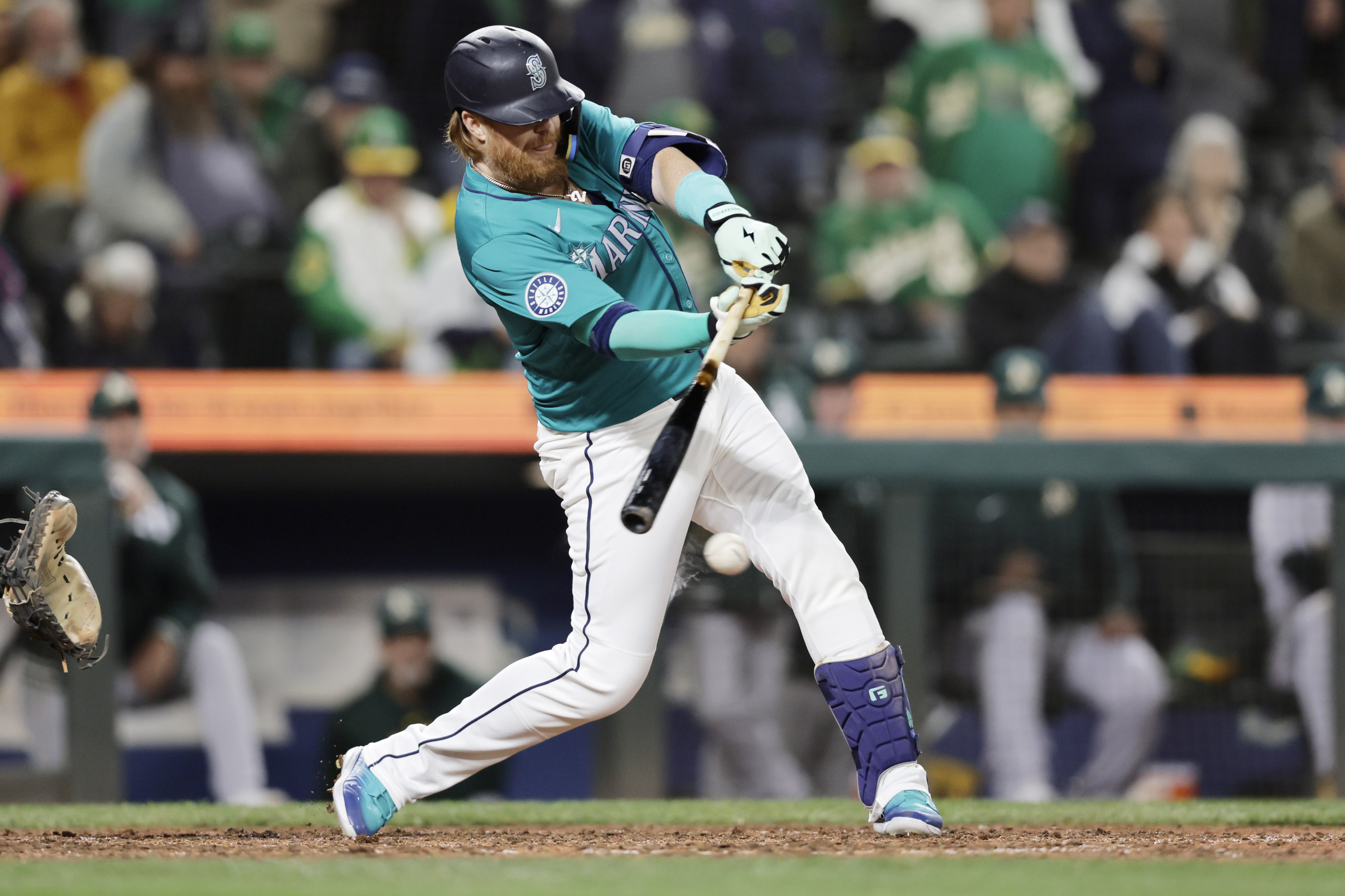 Raley rallies Mariners twice, Raleigh homers in 7-6 win over A's in 10 innings