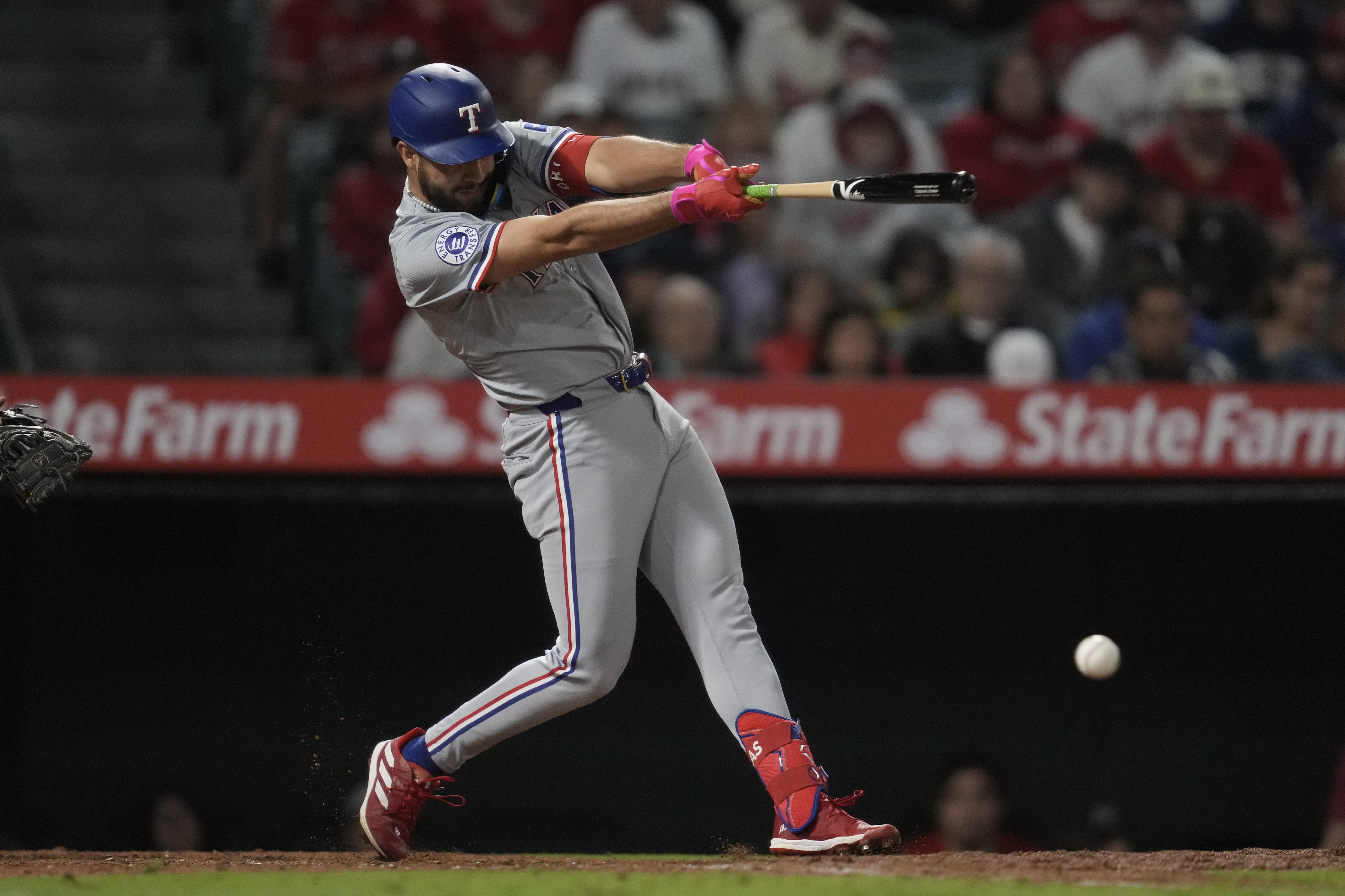 Texas Rangers' Jonathan Ornelas singles during the ninth inning of a baseball game against the Texas Rangers in Anaheim, Calif., Saturday, Sept. 28, 2024. Wyatt Langford, Matt Duffy, and Nathaniel Lowe scored. 