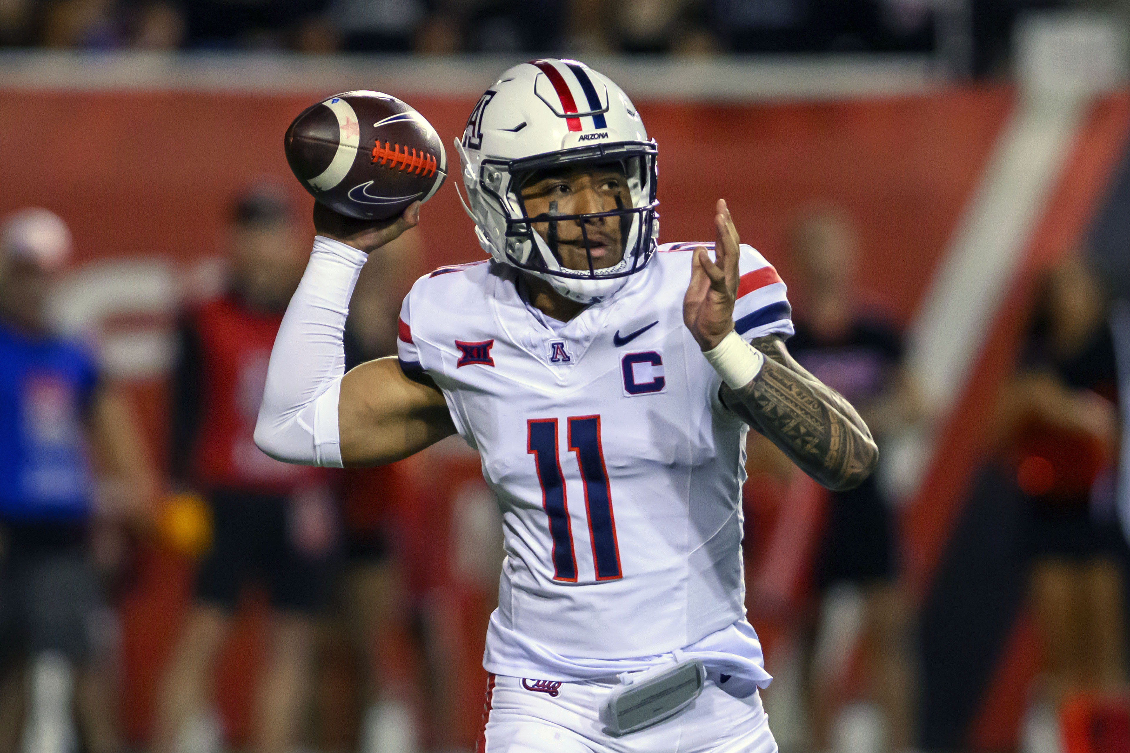 Fifita throws 2 TDs and Arizona's defense stops No. 10 Utah on four 4th downs in 23-10 win