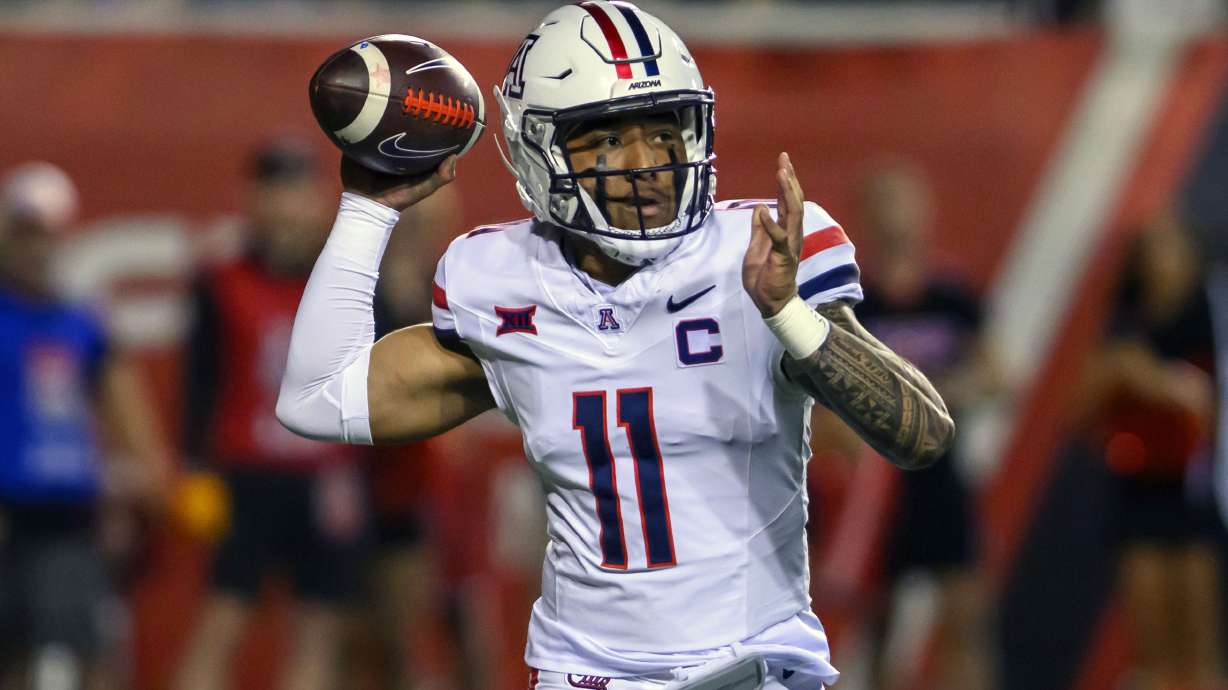 Arizona quarterback Noah Fifita looks to pass the ball against Utah during an NCAA college football game Saturday, Sept. 28, 2024, in Salt Lake City, Utah.