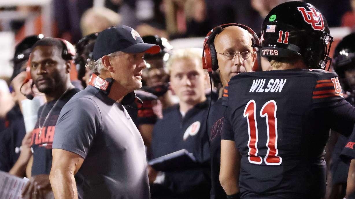Utah Utes head coach Kyle Whittingham looks Utah Utes quarterback Isaac Wilson (11) after he was injured in Salt Lake City on Saturday, Sept. 28, 2024.
