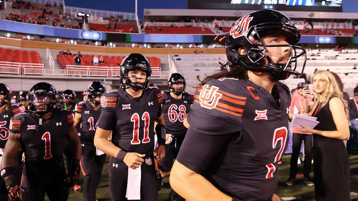 Utah Utes quarterback Cameron Rising (7) and Utah Utes quarterback Isaac Wilson (11) run onto the field for warmups against the Arizona Wildcats in Salt Lake City on Saturday, Sept. 28, 2024.