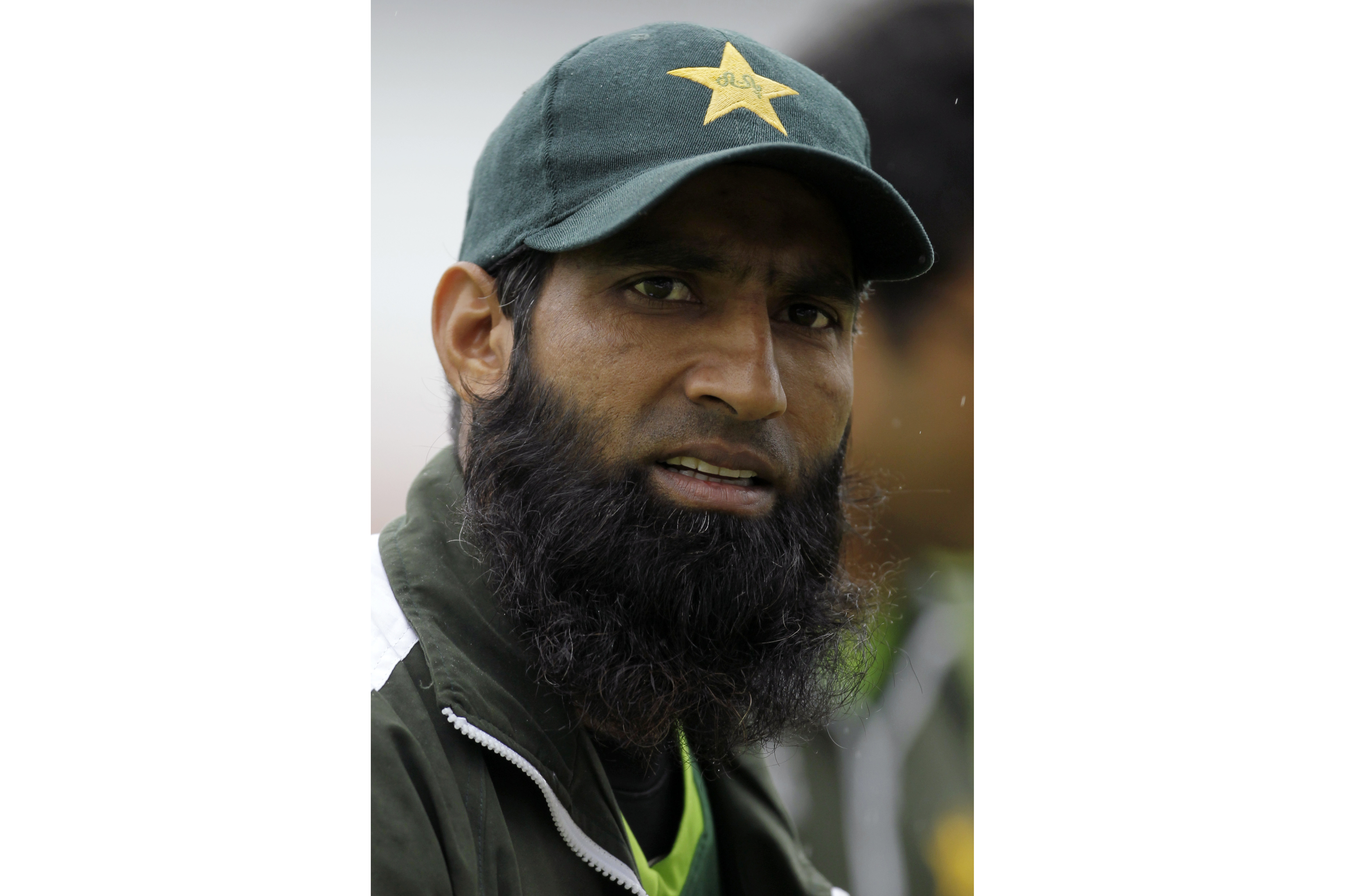 FILE - Pakistan's Mohammad Yousuf walks to an indoor training session due to rainfall at Lord's cricket ground in London, on Aug. 25, 2010. 