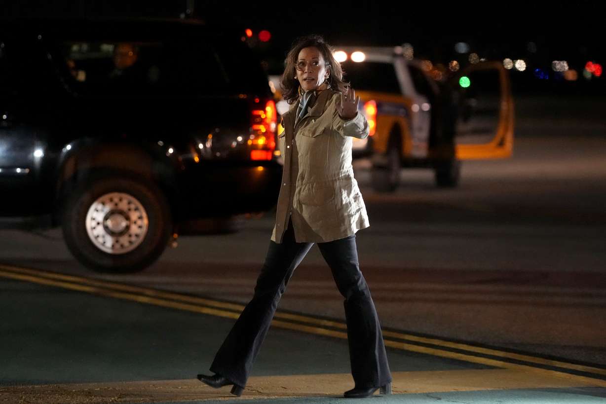 Democratic presidential nominee Vice President Kamala Harris waves as she arrives in San Francisco on Friday.