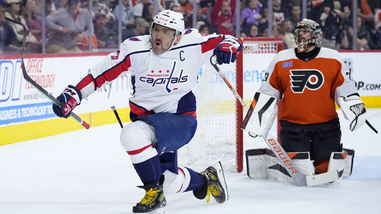 FILE - Washington Capitals' Alex Ovechkin, left, reacts after scoring a goal against Philadelphia Flyers' Samuel Ersson during the first period of an NHL hockey game, Tuesday, April 16, 2024, in Philadelphia.