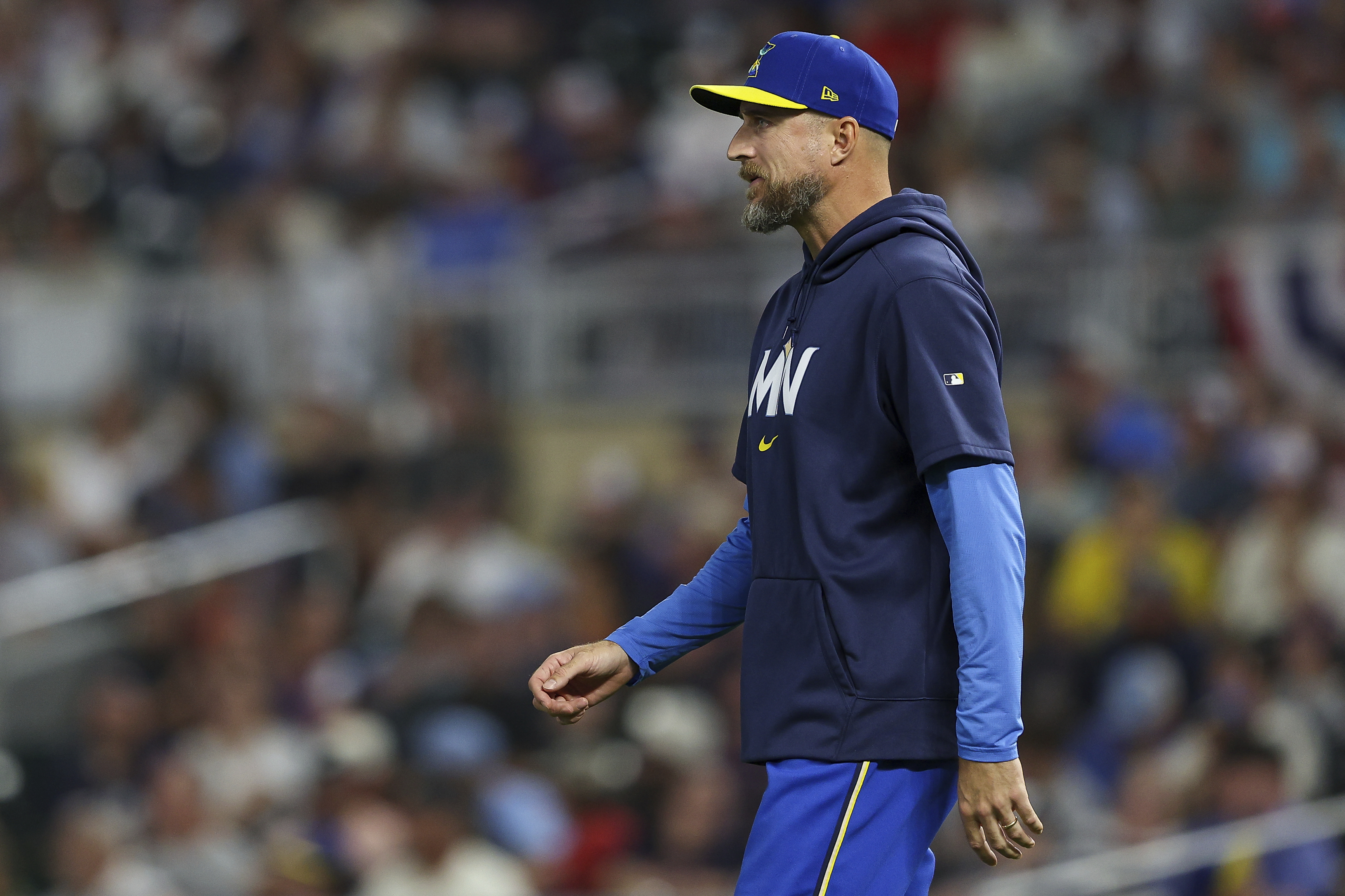 Minnesota Twins manager Rocco Baldelli walks out to the mound during the sixth inning of a baseball game against the Baltimore Orioles, Friday, Sept. 27, 2024, in Minneapolis.