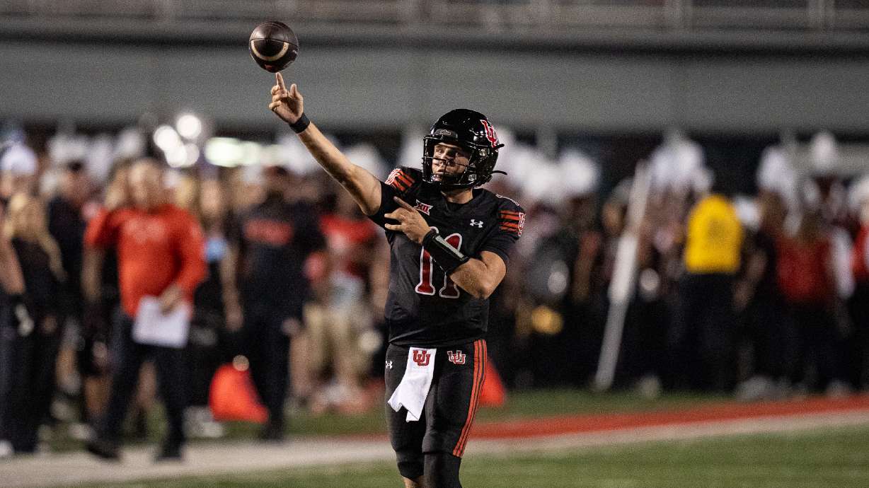 Utah quarterback Isaac Wilson throws a pass against Arizona in a game at Rice-Eccles Stadium in Salt Lake City on Sept. 28, 2024.