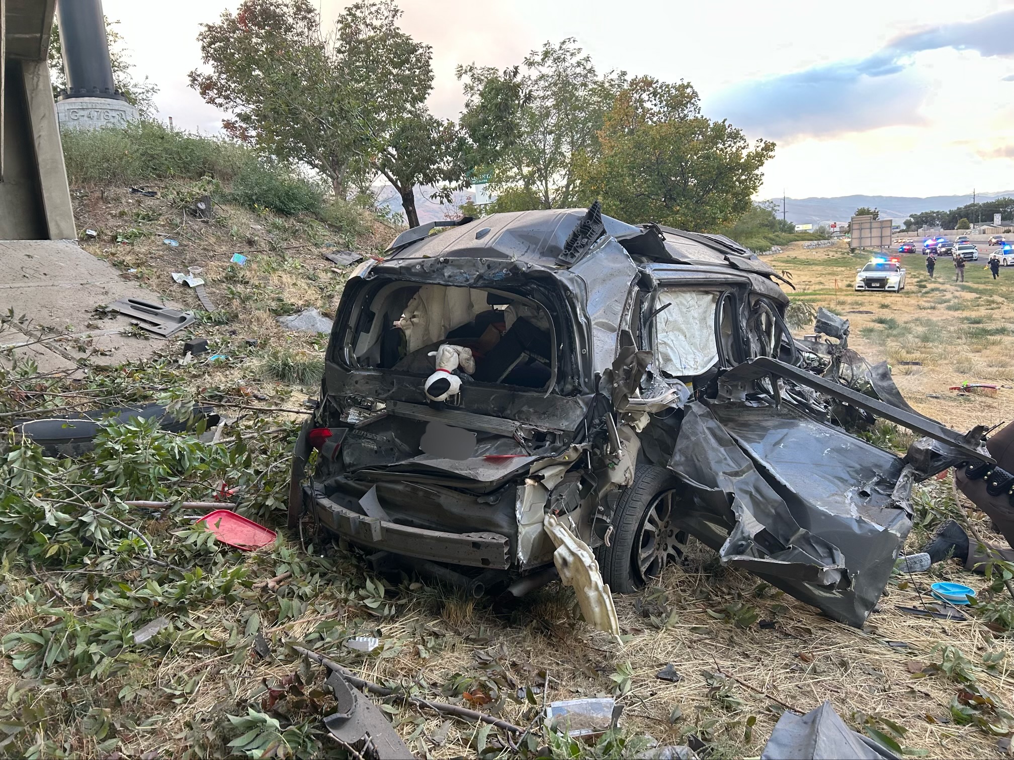 Utah Highway Patrol look over the scene after a pursuit and fatality accident on I-15 and Antelope Drive in Layton on Sunday.