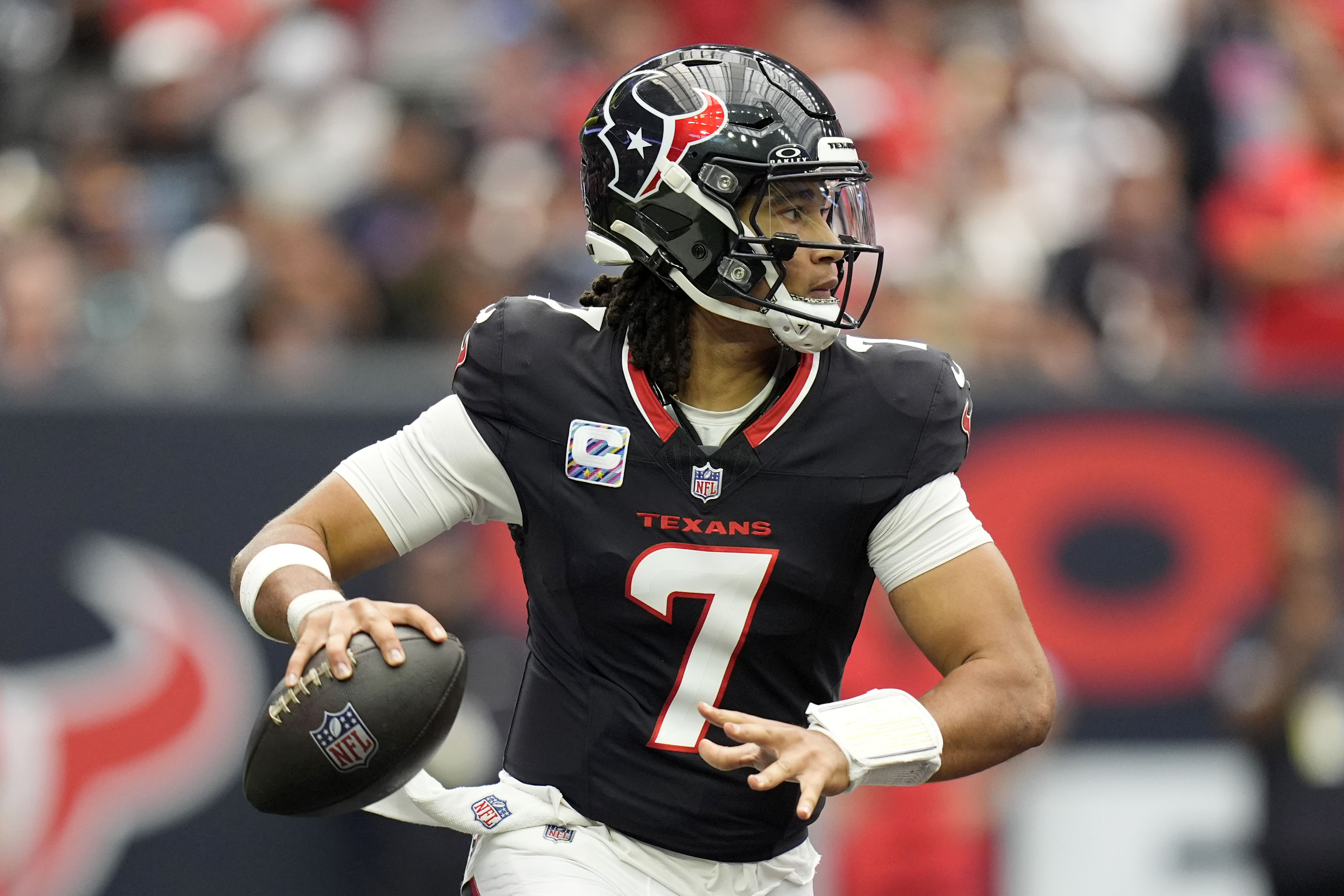 Houston Texans quarterback C.J. Stroud (7) looks to pass during the second half of an NFL football game against the Jacksonville Jaguars, Sunday, Sept. 29, 2024, in Houston.