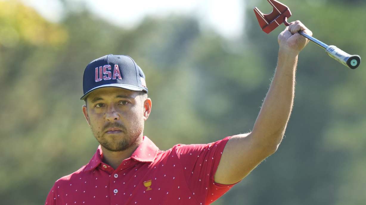 United States team member Xander Schauffele reacts after making a birdie on the first hole during their fifth round singles match at the Presidents Cup golf tournament at Royal Montreal Golf Club on Sunday, Sept. 29, 2024, in Montreal.