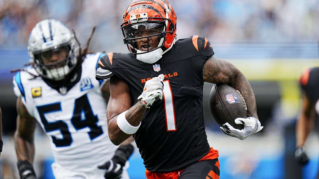 Cincinnati Bengals wide receiver Ja'Marr Chase runs for a touchdown against the Carolina Panthers during the first half of an NFL football game, Sunday, Sept. 29, 2024, in Charlotte, N.C.