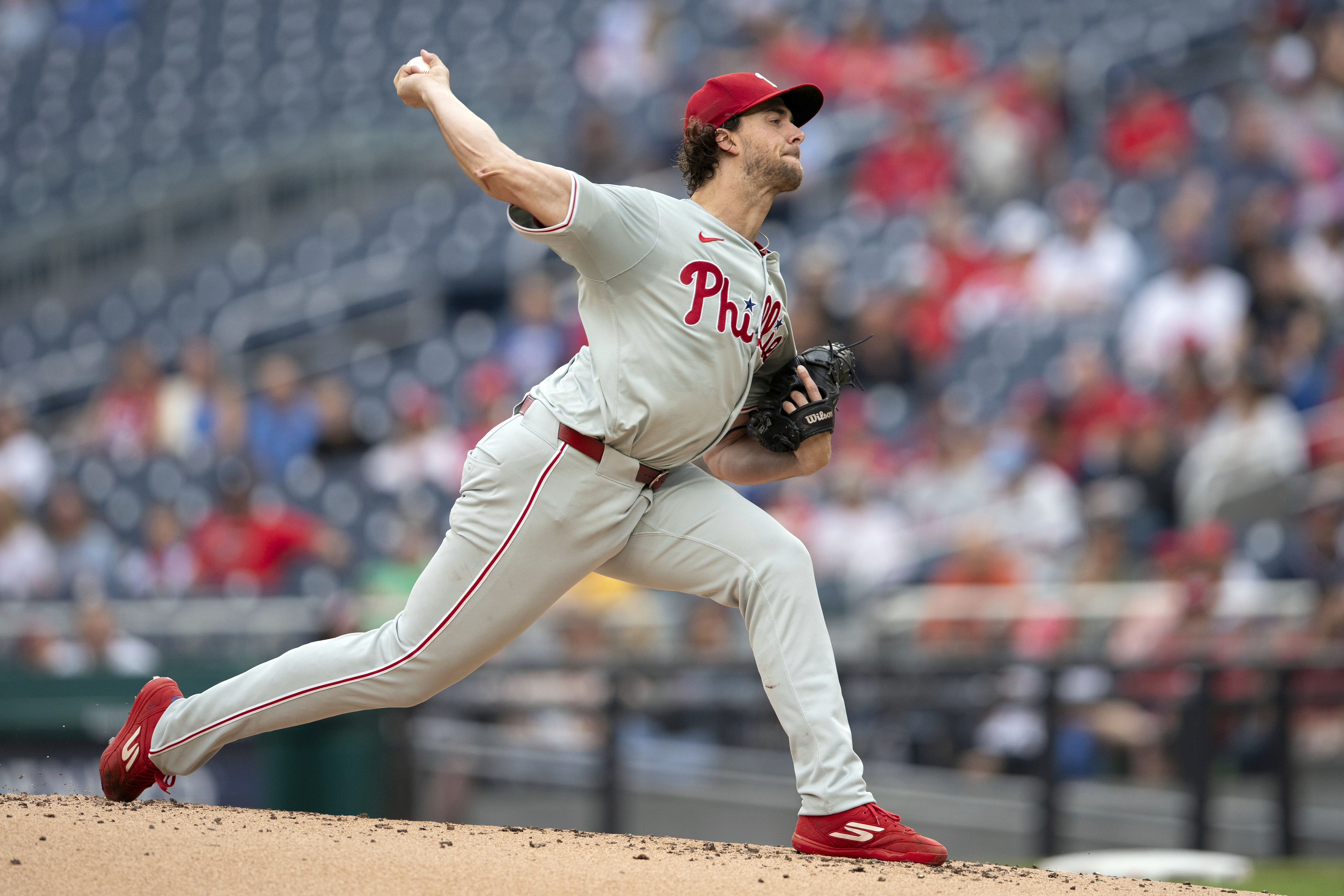 Philadelphia Phillies starting pitcher Aaron Nola throws during the first inning of a baseball game against the Washington Nationals, Sunday, Sept. 29, 2024, in Washington. 