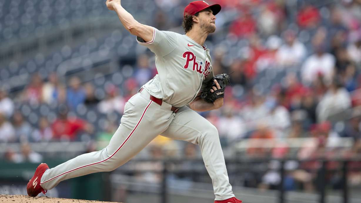 Philadelphia Phillies starting pitcher Aaron Nola throws during the first inning of a baseball game against the Washington Nationals, Sunday, Sept. 29, 2024, in Washington.