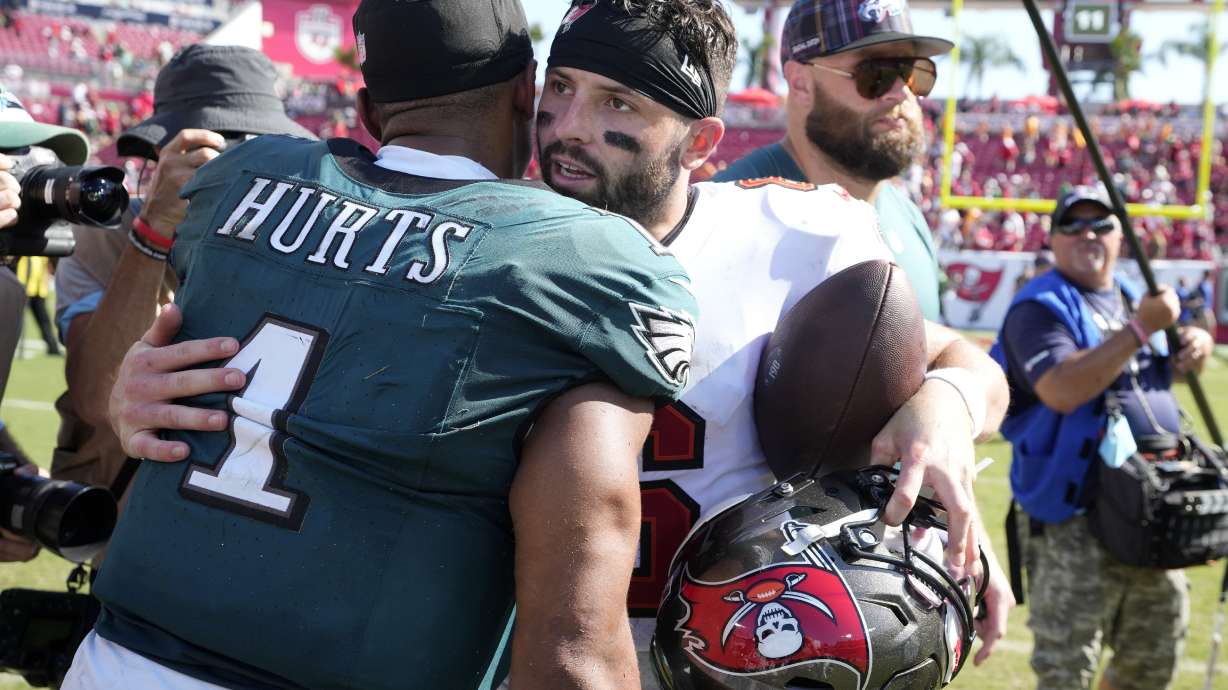 Tampa Bay Buccaneers' Baker Mayfield, right, and Philadelphia Eagles' Jalen Hurts meet after an NFL football game, Sunday, Sept. 29, 2024, in Tampa, Fla.
