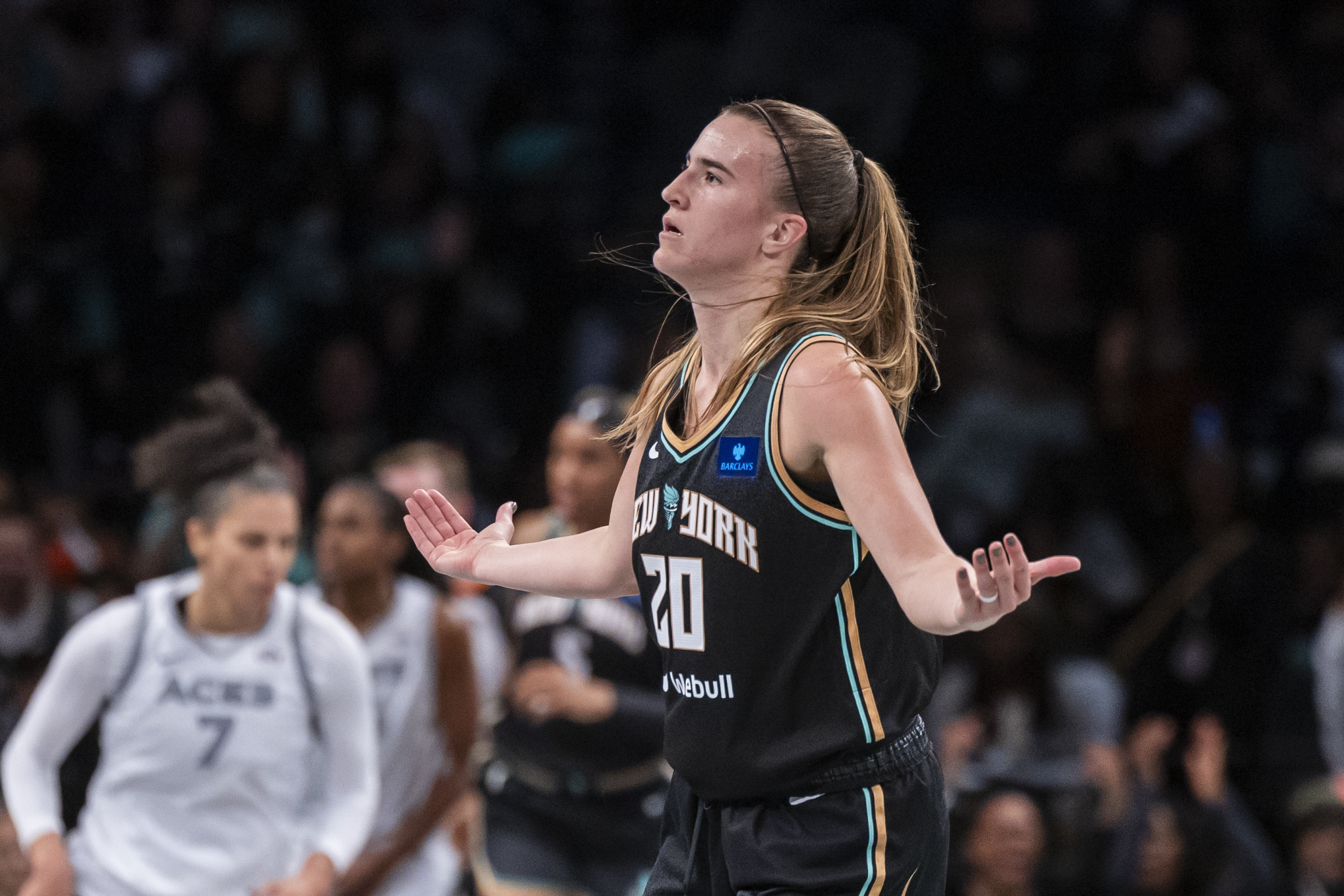 New York Liberty guard Sabrina Ionescu (20) celebrates after a basket during the second half of a WNBA basketball second-round playoff game against the Las Vegas Aces, Sunday, Sept. 29, 2024, in New York.