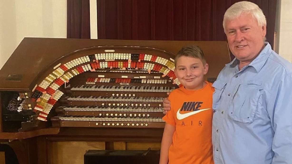 Kobin Harris is with his organ teacher Jim Clark. Harris picked up organ lessons as he recovered from brain surgery and today the accomplished 11-year-old frequently performs music.