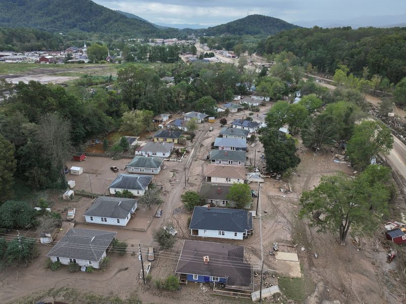 A drone view shows houses in a damaged area, following the passing of Hurricane Helene, in Swannanoa, North Carolina, Sunday.