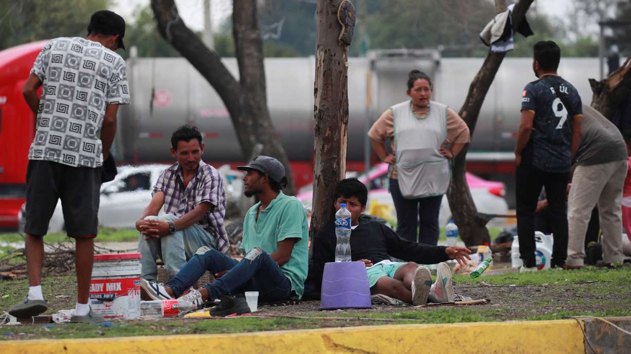 Migrants, mostly from Venezuela rest near a makeshift camp near the North Bus Station in Mexico City, Mexico, July 24. A group of Utahns came together over the weekend for an experiment in getting along by talking about immigration.