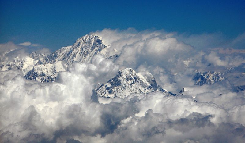 Mount Everest or Sagarmatha, highest peak in the world with an altitude of 29,028 feet, is seen in this aerial view. Earth's tallest mountain is still growing.