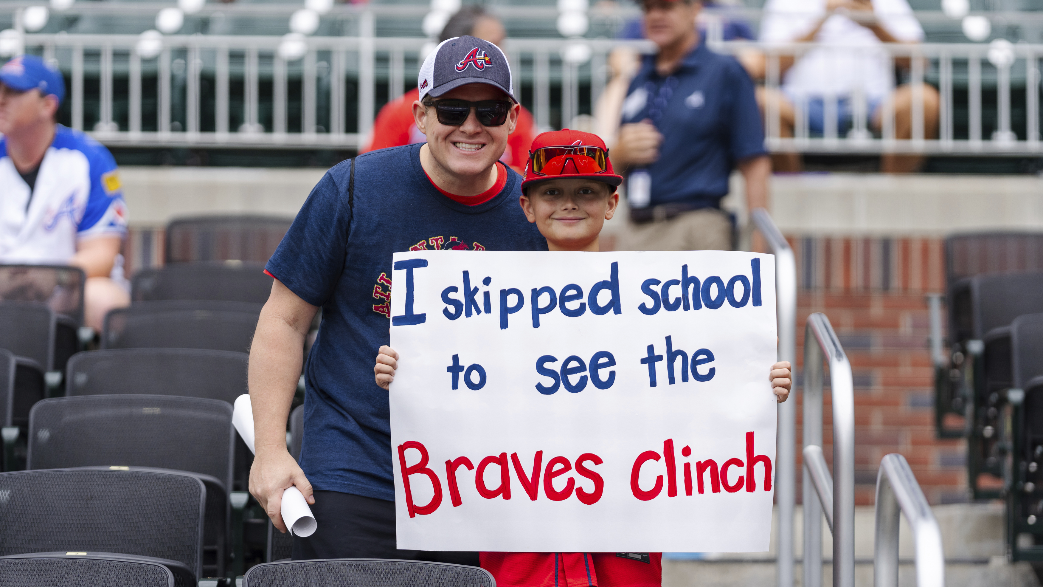 Atlanta Braves fans await for the start of a baseball game against the New York Mets, Monday, Sept. 30, 2024, in Atlanta.