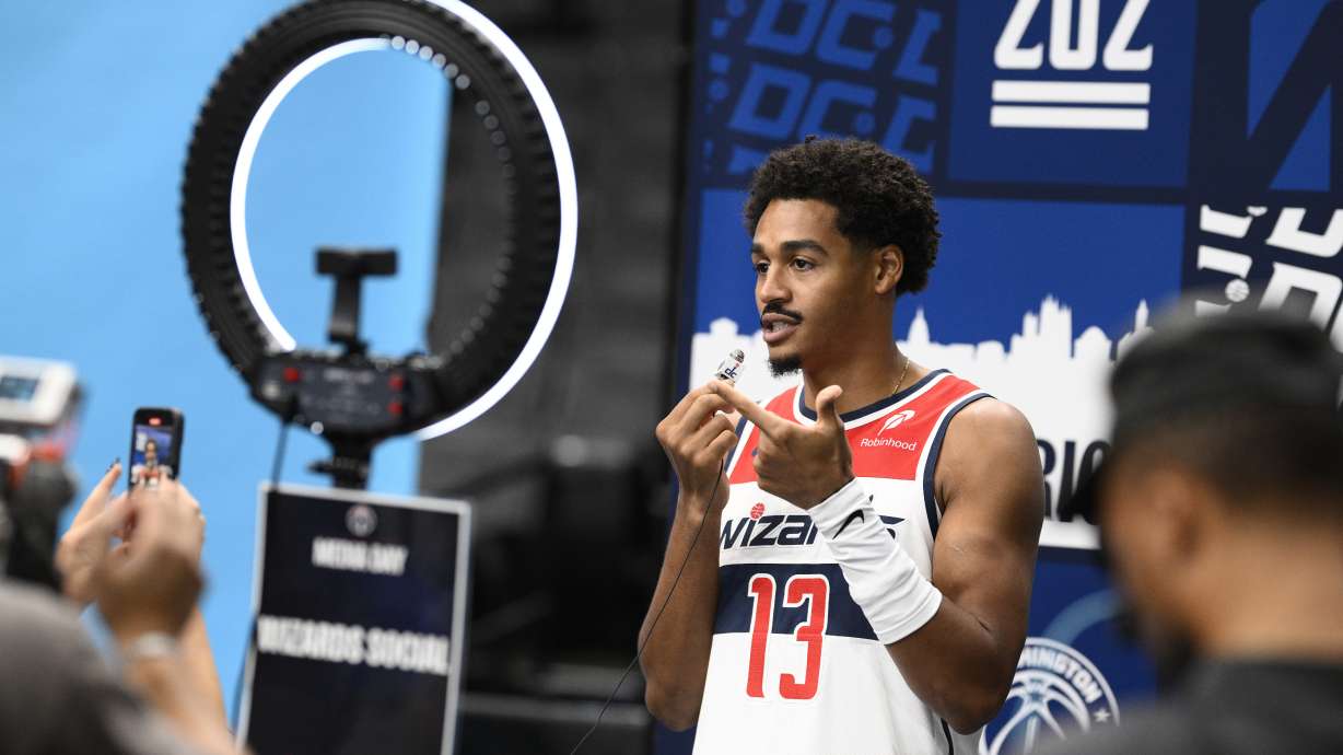 Washington Wizards guard Jordan Poole does a social media spot during the NBA basketball team's media day, Monday, Sept. 30, 2024, in Washington.
