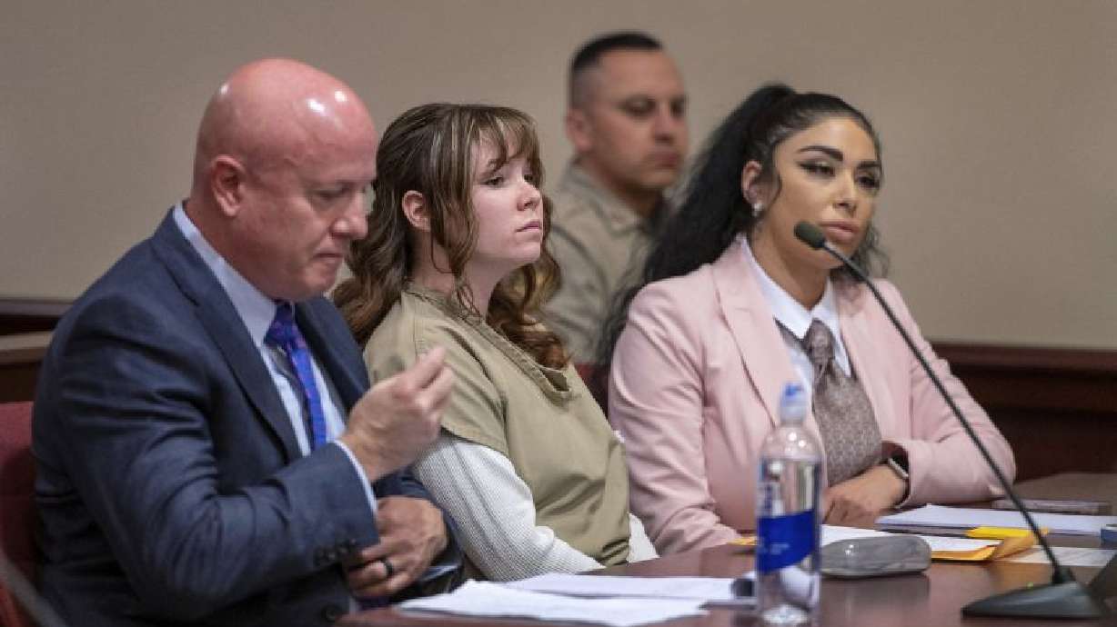 Hannah Gutierrez-Reed, center, with her attorney Jason Bowles, left, and paralegal Carmella Sisneros, right, in state district court in Santa Fe, N.M., April 15. A judged on Monday denied a request to throw out the conviction of Gutierrez-Reed.