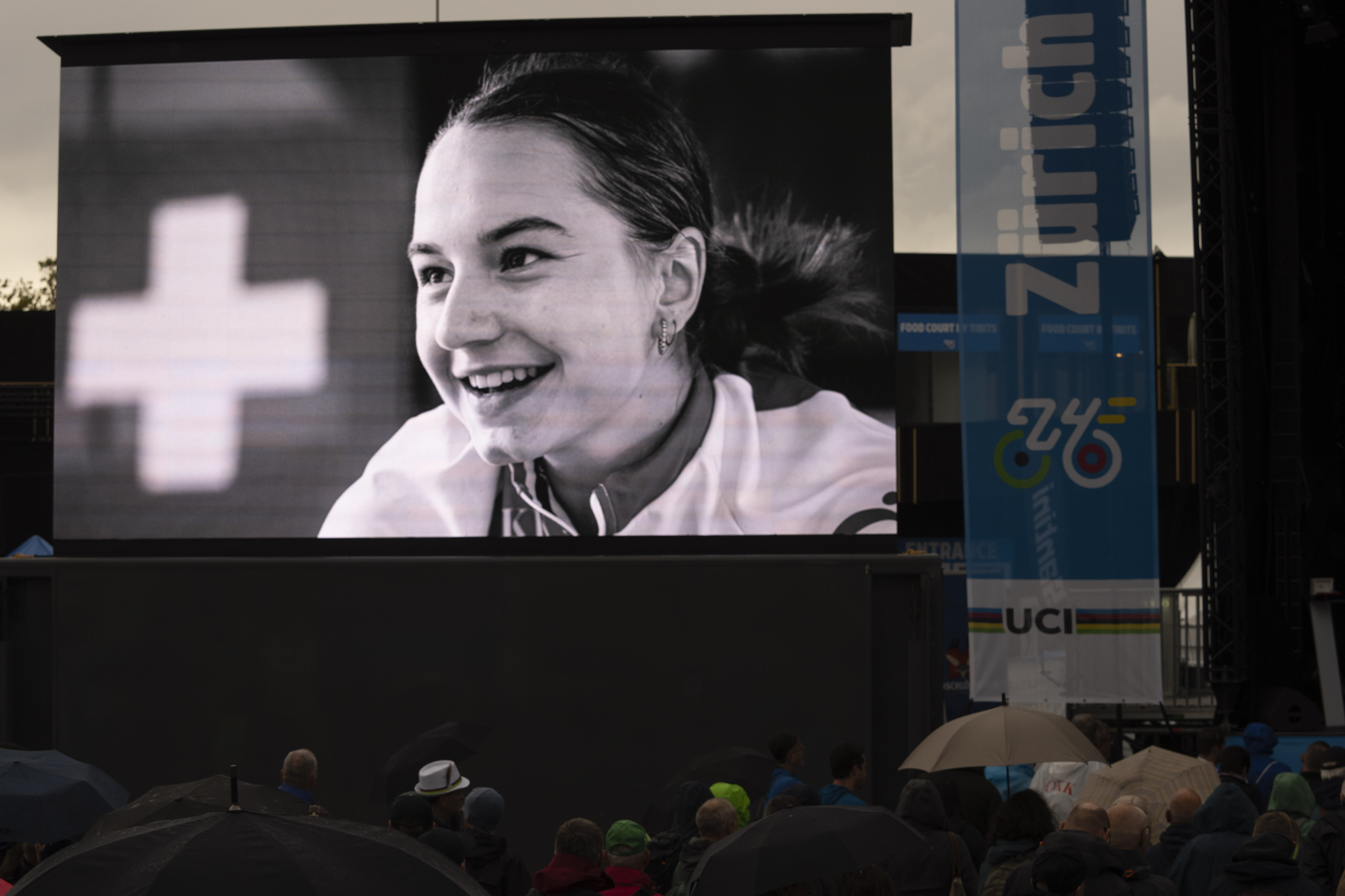 A picture of cyclist Muriel Furrer from Switzerland who died after a crash Thursday, is projected during a minute of silence at the Cycling and Para-cycling Road World Championships in Zurich, Switzerland, Friday, Sept. 27, 2024. 