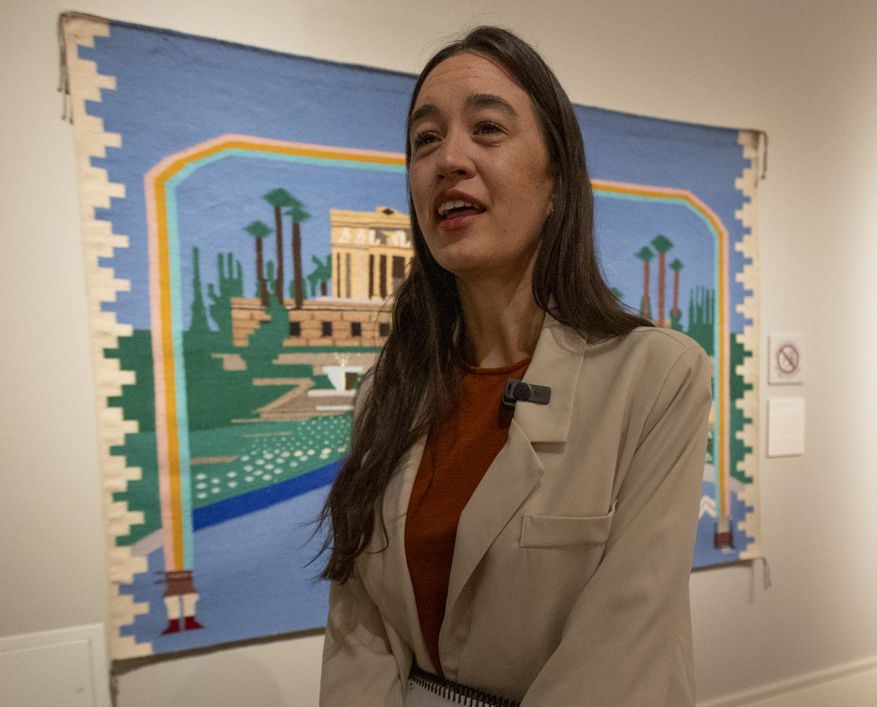 Executive director of the Center for Latter-day Saint Arts Mykal Urbina talks about different pieces during an exhibition organized by the Church History Museum and the Center for Latter-day Saint Arts featuring art created by, for, and about Latter-day Saints between 1830 and the present, in Salt Lake City on Monday.