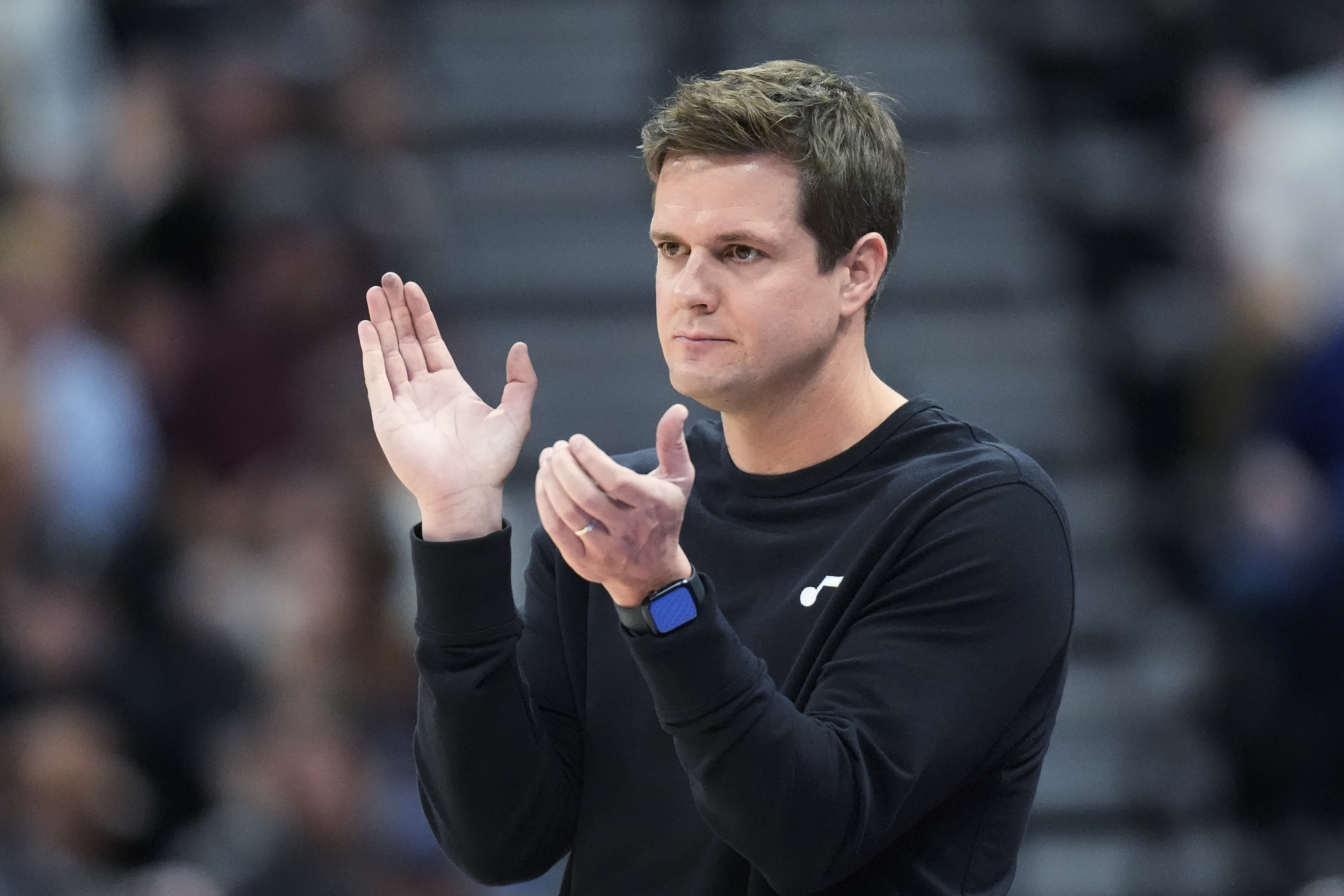 FILE - Utah Jazz coach Will Hardy applauds during the second half of the team's NBA basketball game against the Houston Rockets, April 11, 2024, in Salt Lake City. 