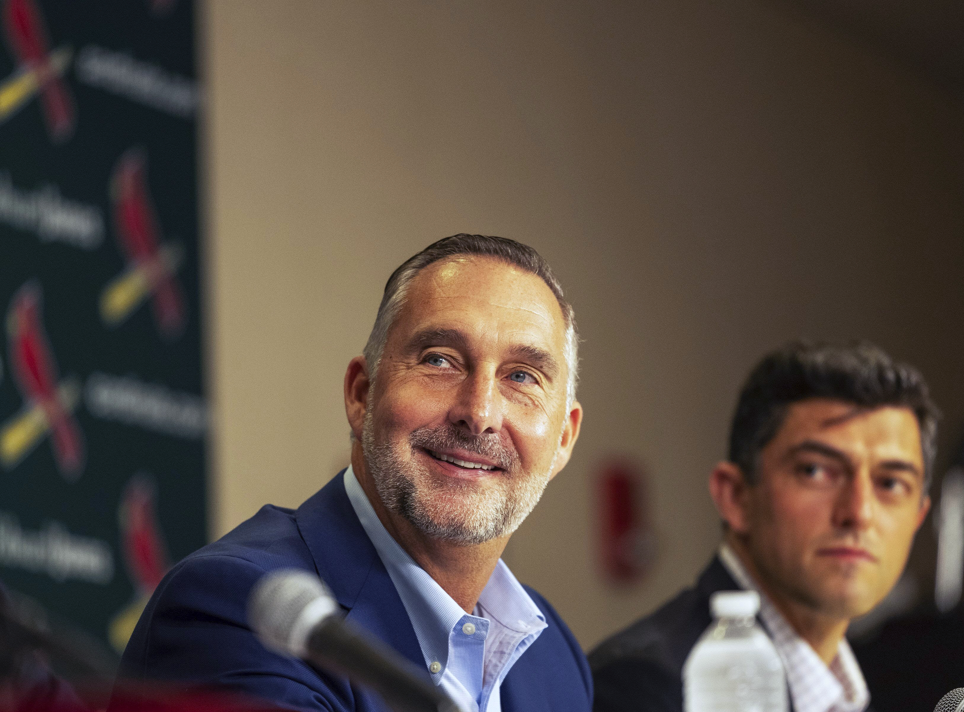 St. Louis Cardinals President of baseball operations John Mozeliak, left, fields questions from reporters as Chaim Bloom looks on during a press conference Monday, Sept. 30, 2024, at Busch Stadium in St. Louis. 
