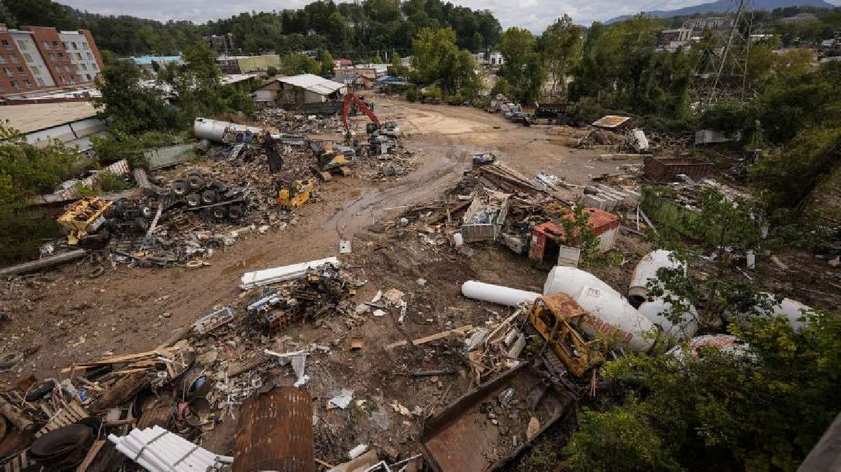 Debris is seen in the aftermath of Hurricane Helene, Monday in Asheville, N.C. A crisis is unfolding as areas hit by the hurricane struggle to get water, food and other supplies.