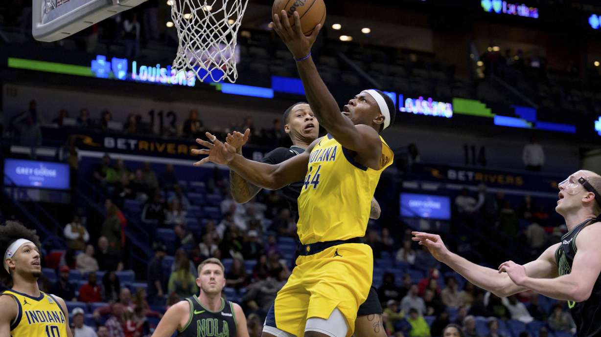 Indiana Pacers center Oscar Tshiebwe (44) shoots against New Orleans Pelicans guard Jordan Hawkins during the second half of an NBA basketball game in New Orleans, Friday, March 1, 2024.