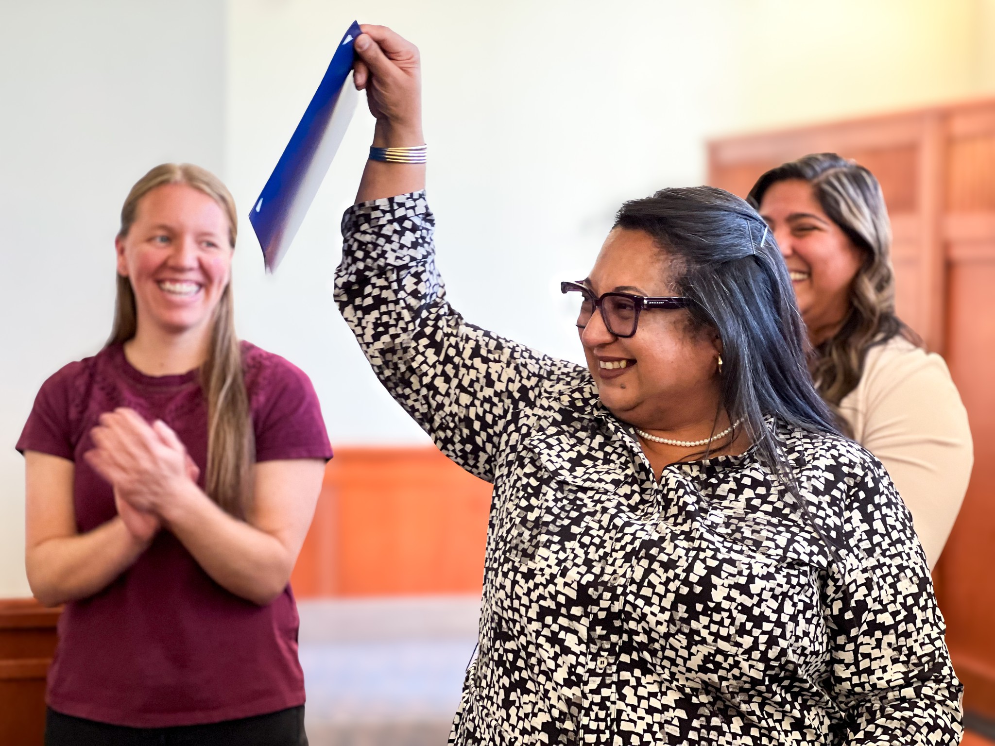 The photo shows Ava Flores, one of nine people who took the oath of naturalization at a ceremony on Monday in Ogden to become a U.S. citizen.