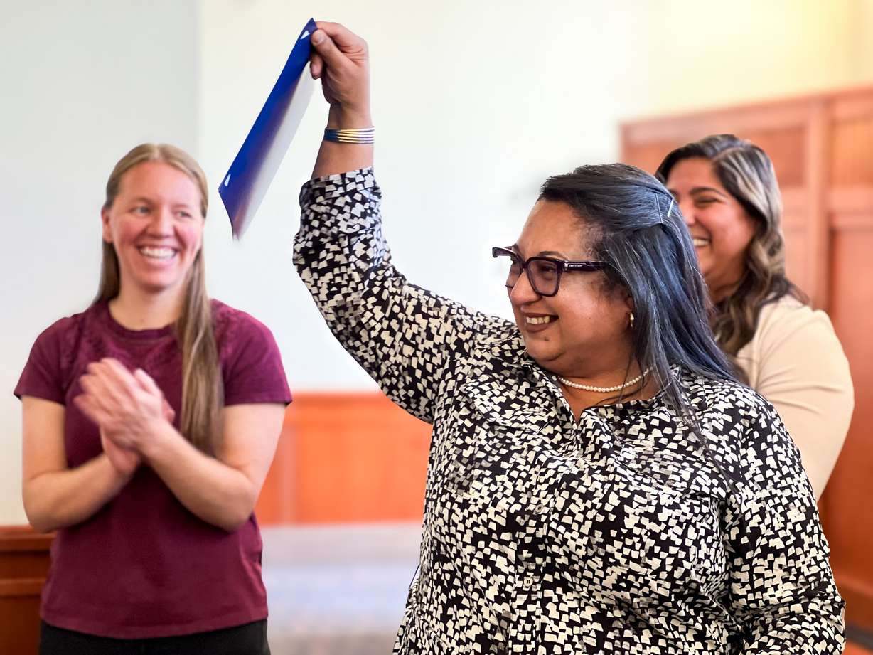 The photo shows Ava Flores, one of nine people who took the oath of naturalization at a ceremony on Monday in Ogden to become a U.S. citizen.