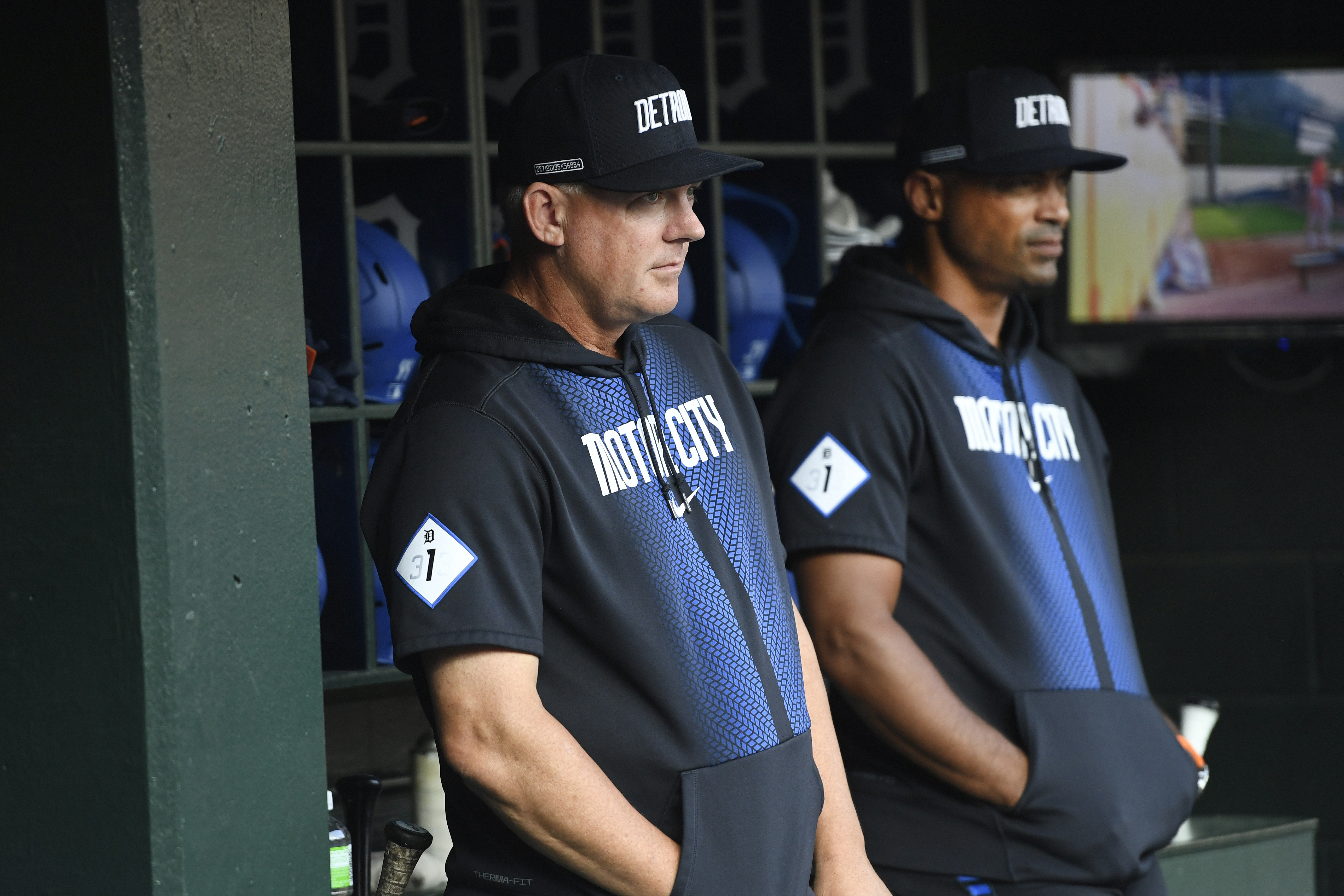 Detroit Tigers manager A.J. Hinch, left, and bench coach George Lombard, right, watch from the dugout before a baseball game against the Baltimore Orioles, Friday, Sept. 13, 2024, in Detroit. 