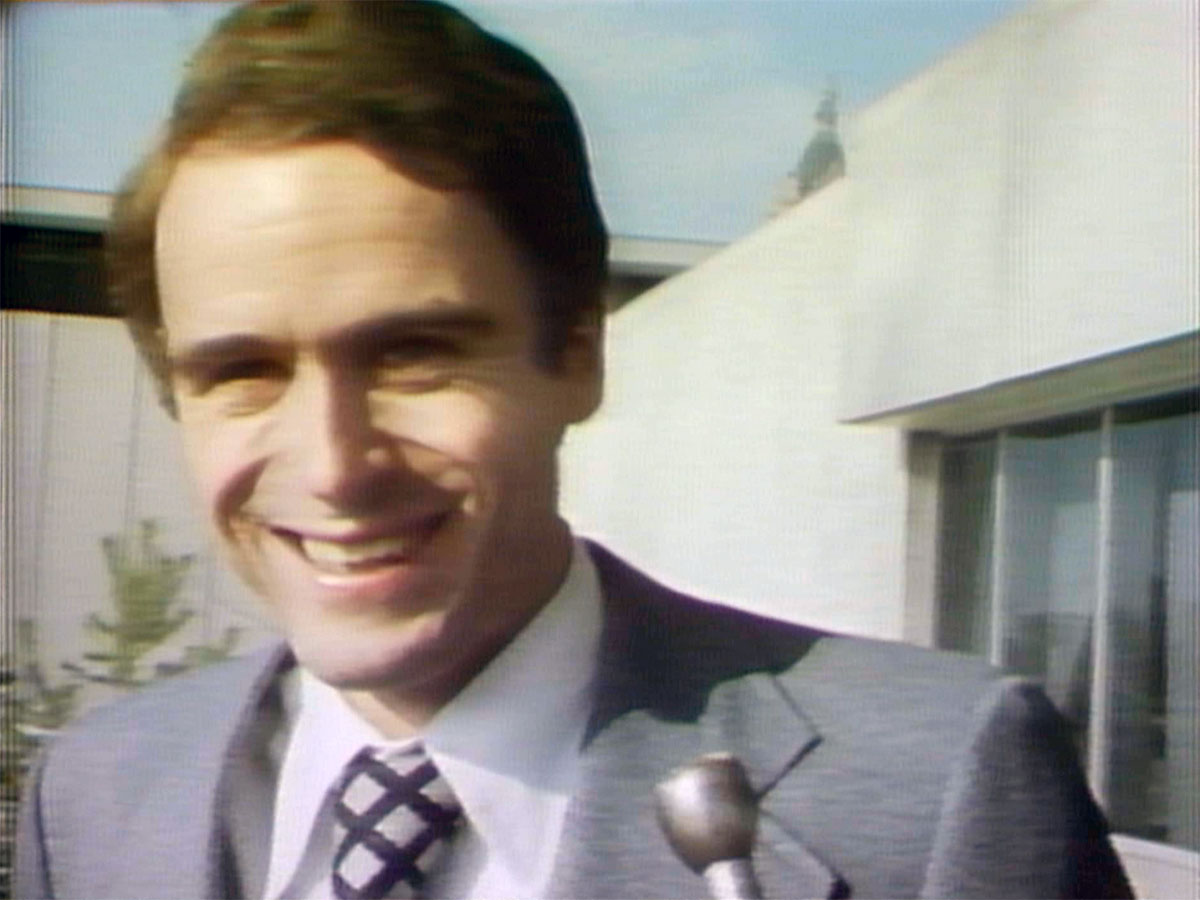 Ted Bundy speaks to reporters outside a courthouse on Nov. 21, 1975.