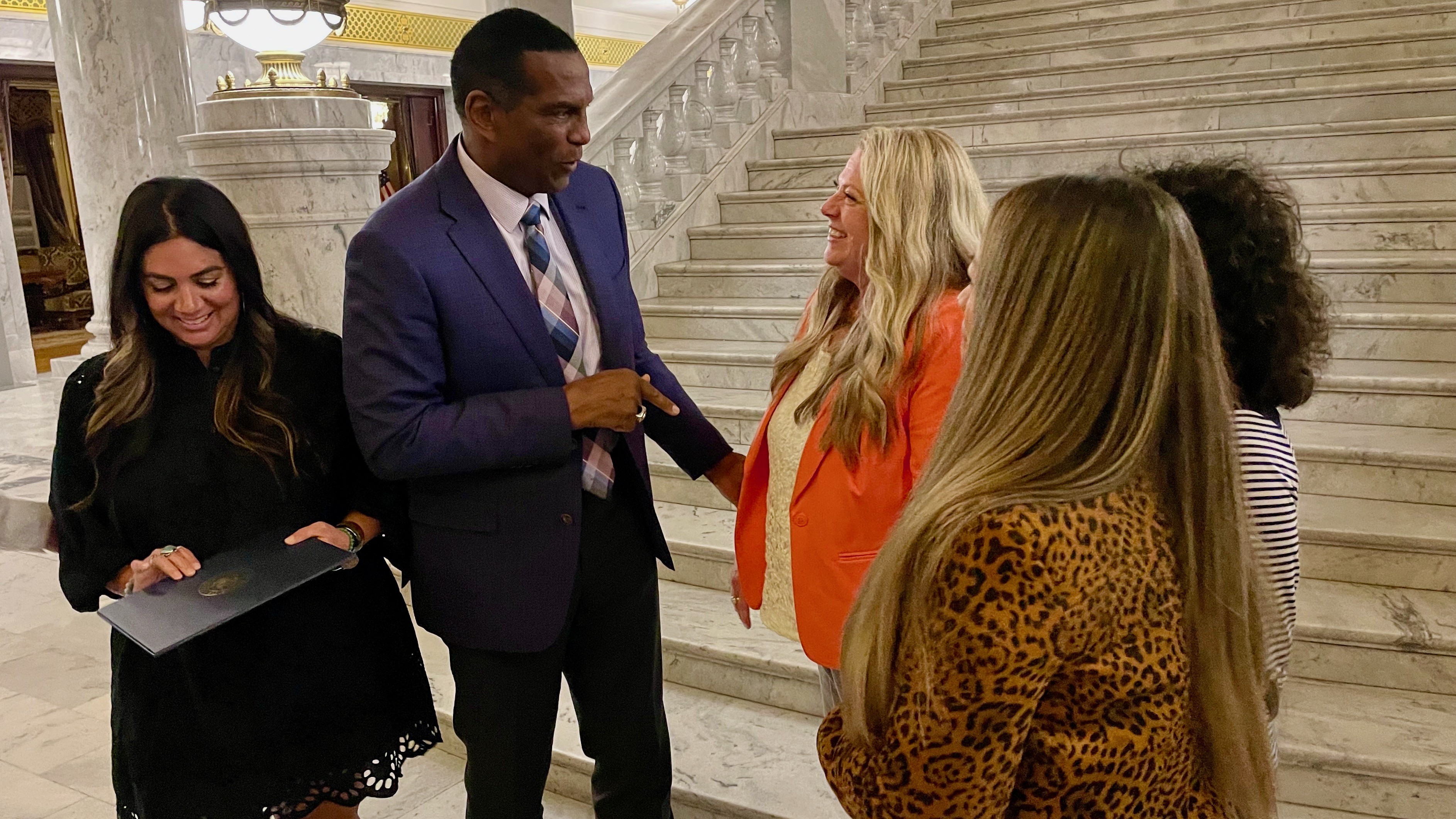 U.S. Rep. Burgess Owens speaks with some of the attendees at a Hispanic Heritage Month ceremony he hosted at the state Capitol in Salt Lake City on Monday.