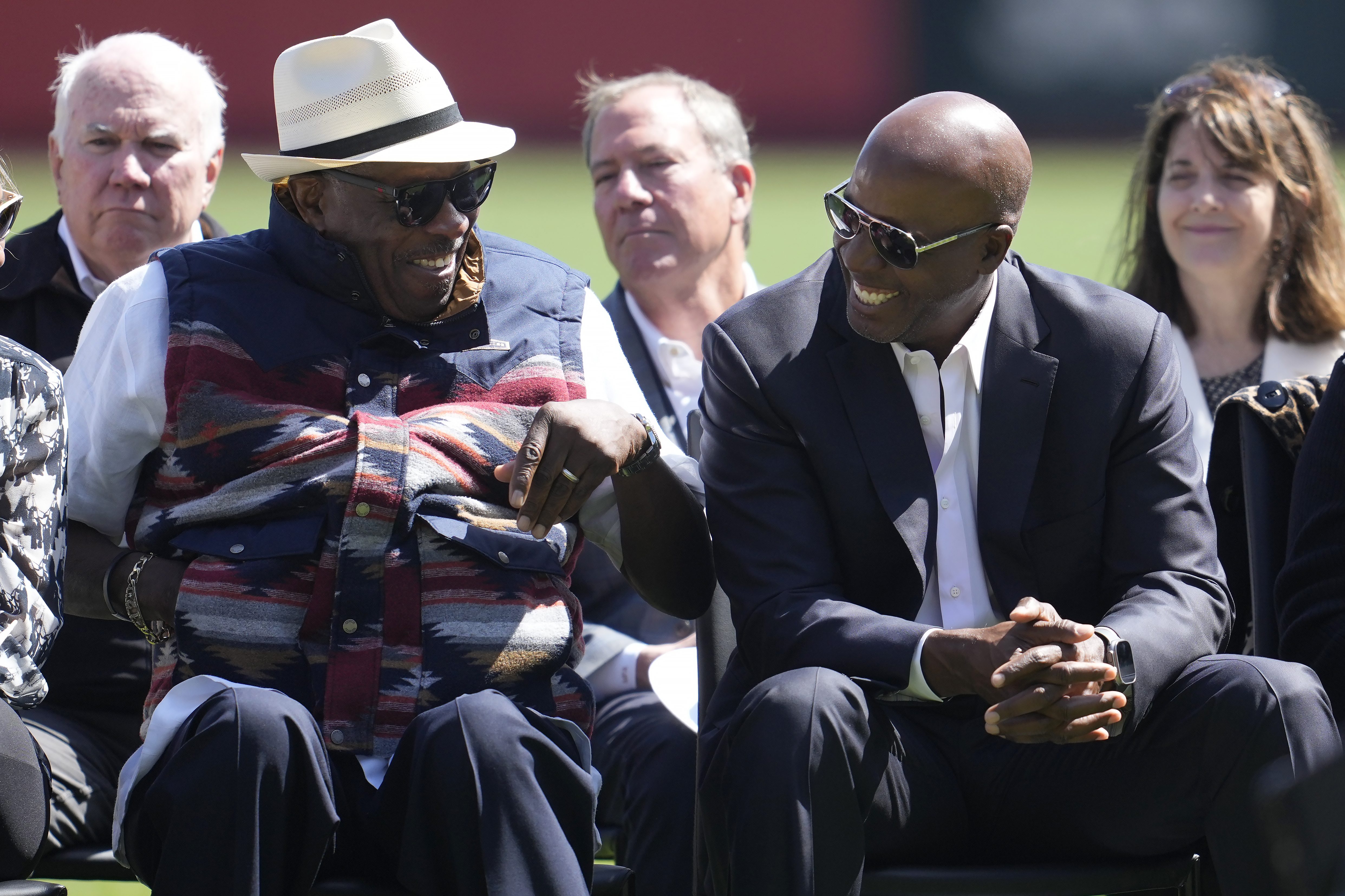 Dusty Baker, left, laughs with Barry Bonds during a ceremony for former San Francisco Giants player Orlando Cepeda before a baseball game between the Giants and the San Diego Padres in San Francisco, Sunday, Sept. 15, 2024. 