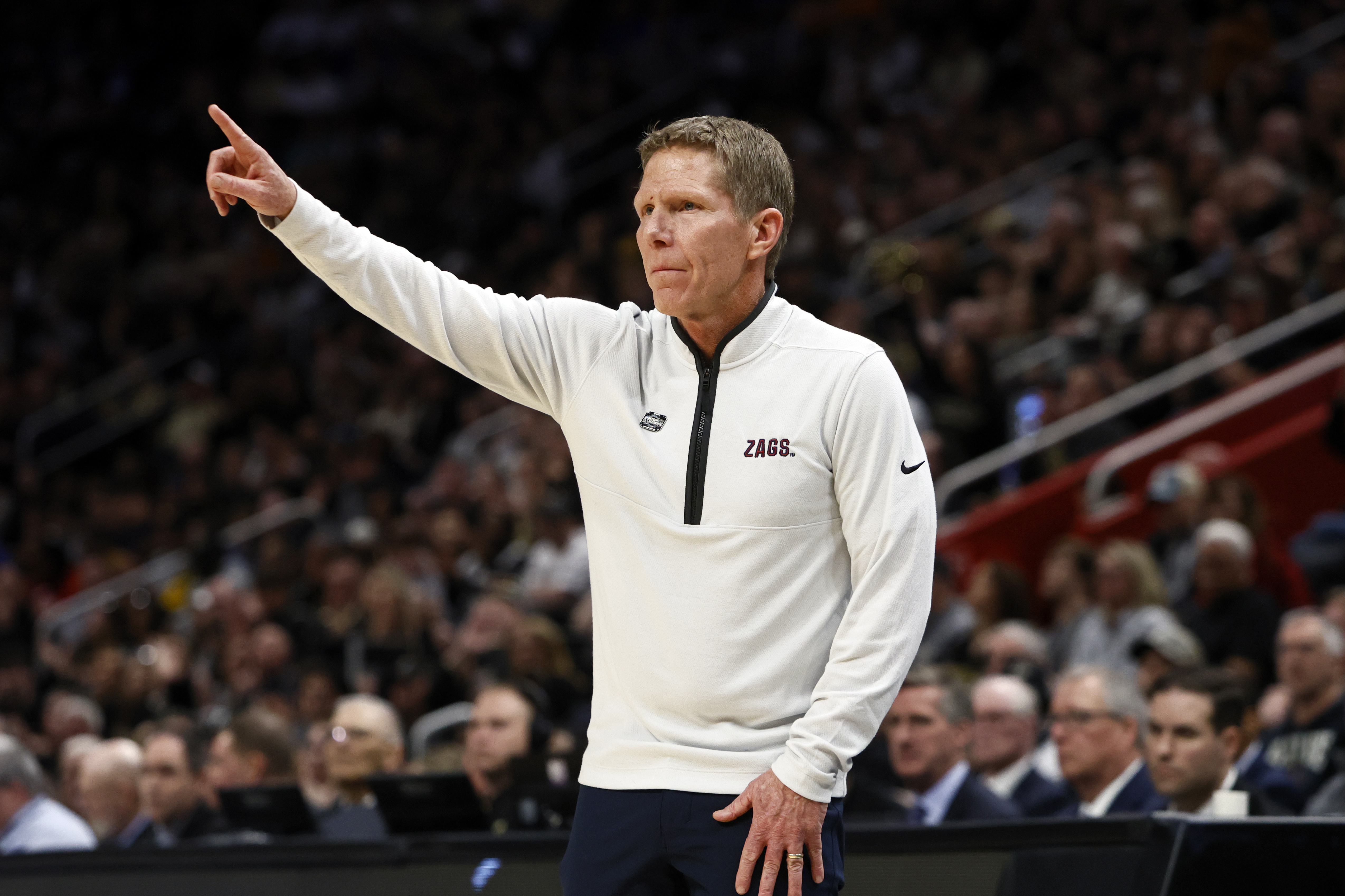 FILE - Gonzaga head coach Mark Few signals from the sideline during the first half of a Sweet 16 college basketball game against Purdue in the NCAA Tournament, March 29, 2024, in Detroit. 