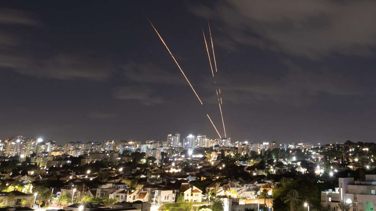 Israel's Iron Dome anti-missile system intercepts rockets, as seen from Ashkelon, Israel, Tuesday,