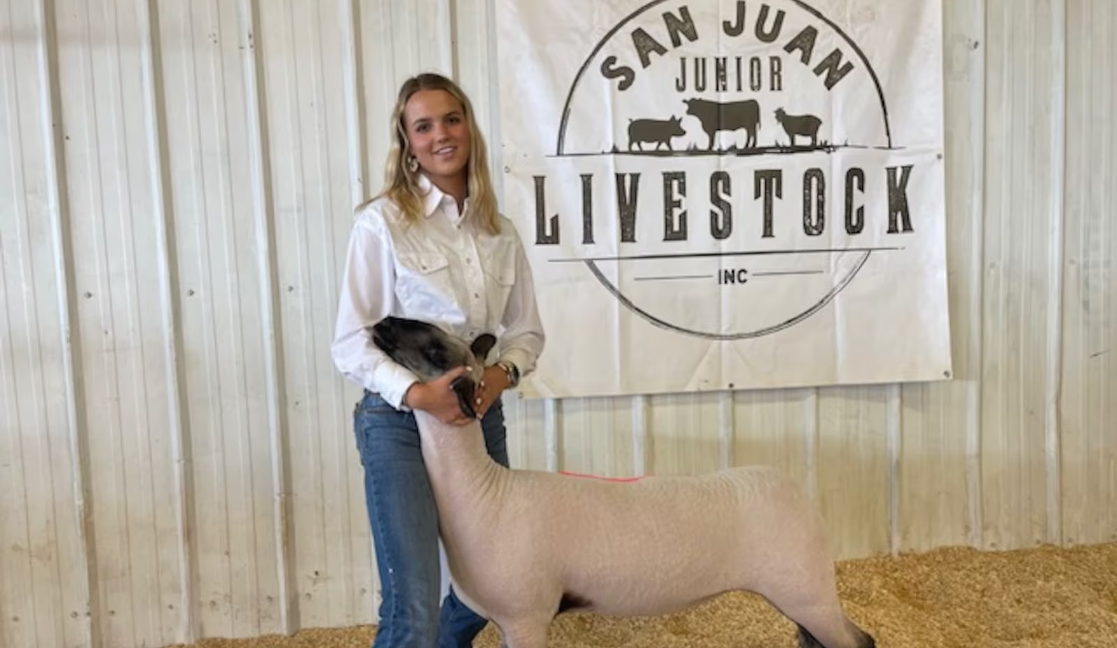 Monticello teenager Alise Lewis is seen just prior to showing her lamb at the San Juan County Fair, where she donated the proceeds of the auction to help another, in this undated photo.