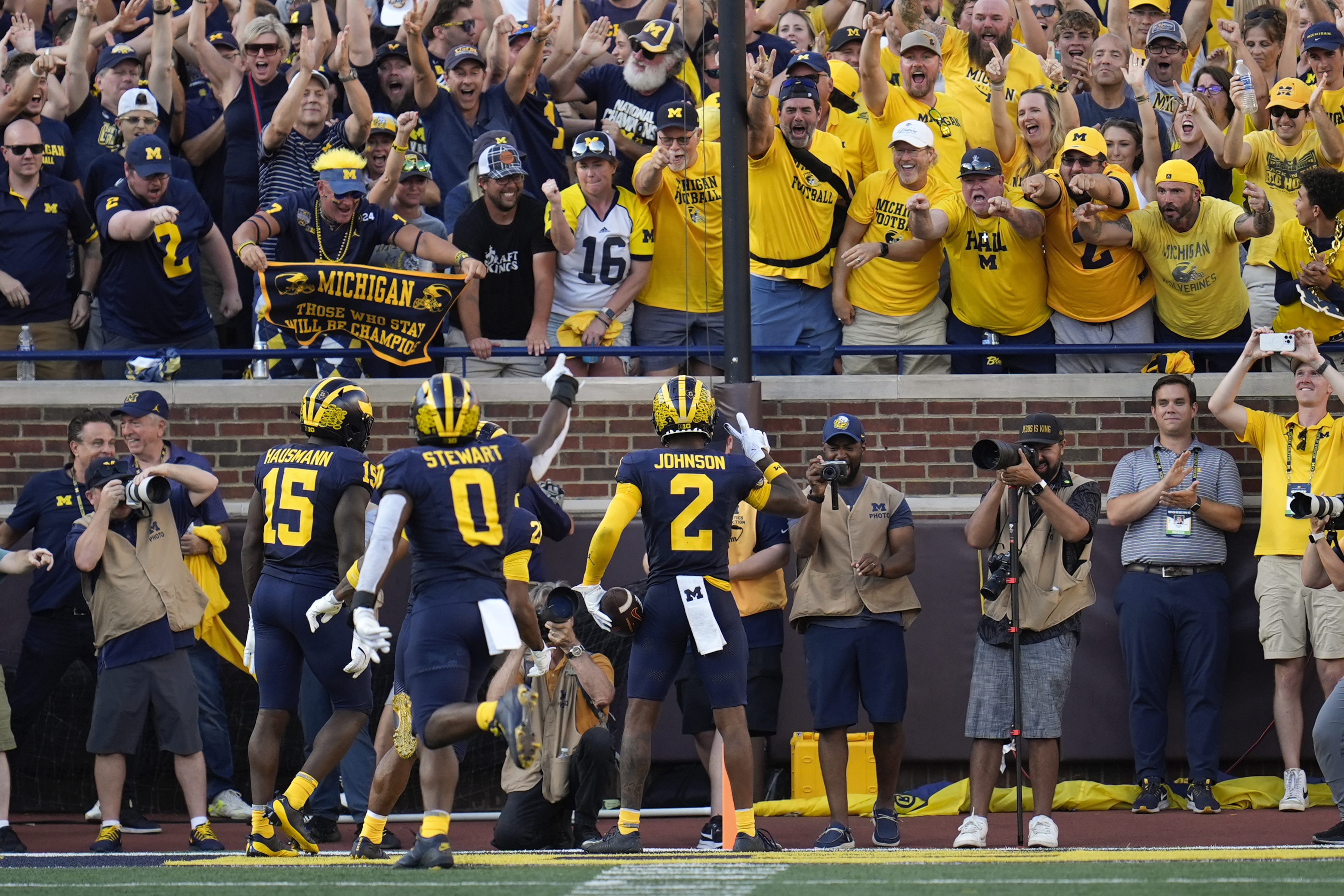 Michigan defensive back Will Johnson (2) celebrates his 42-yard interception for a touchdown against Southern California in the second half of an NCAA college football game in Ann Arbor, Mich., Saturday, Sept. 21, 2024. 