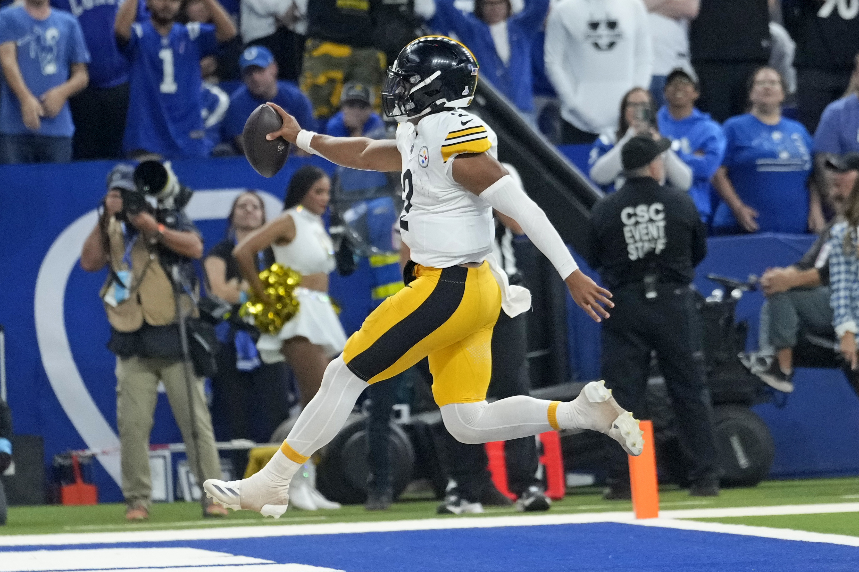 Pittsburgh Steelers quarterback Justin Fields (2) leaps into the end zone for a touchdown during the second half of an NFL football game against the Indianapolis Colts, Sunday, Sept. 29, 2024, in Indianapolis. 