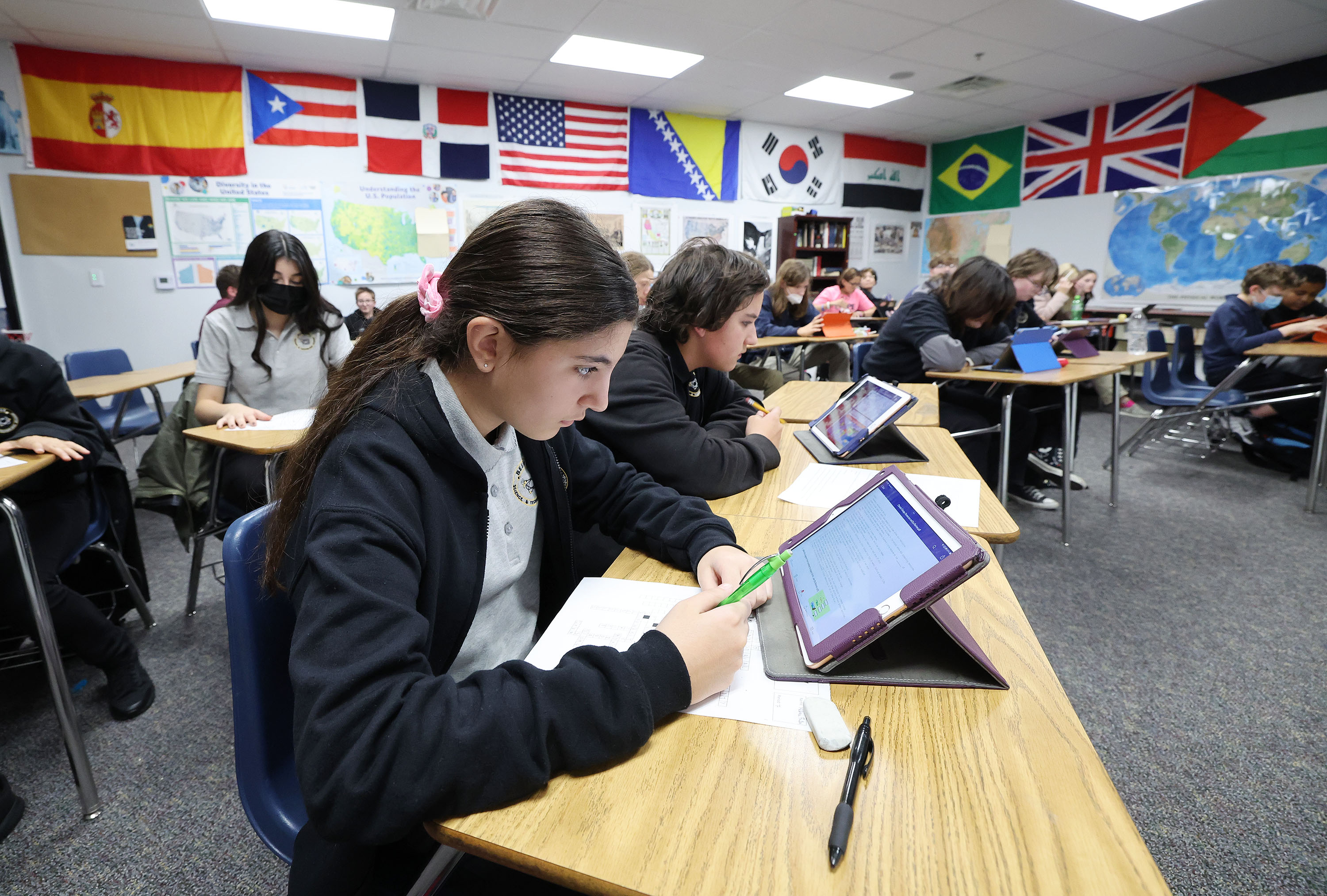 Rebeca Fontes works in a geography class at the Beehive Science and Technology Academy in Sandy on Nov. 3, 2022. Utah's charter school ecosystem is set for a big boost thanks to a $44 million grant from the U.S. Department of Education.