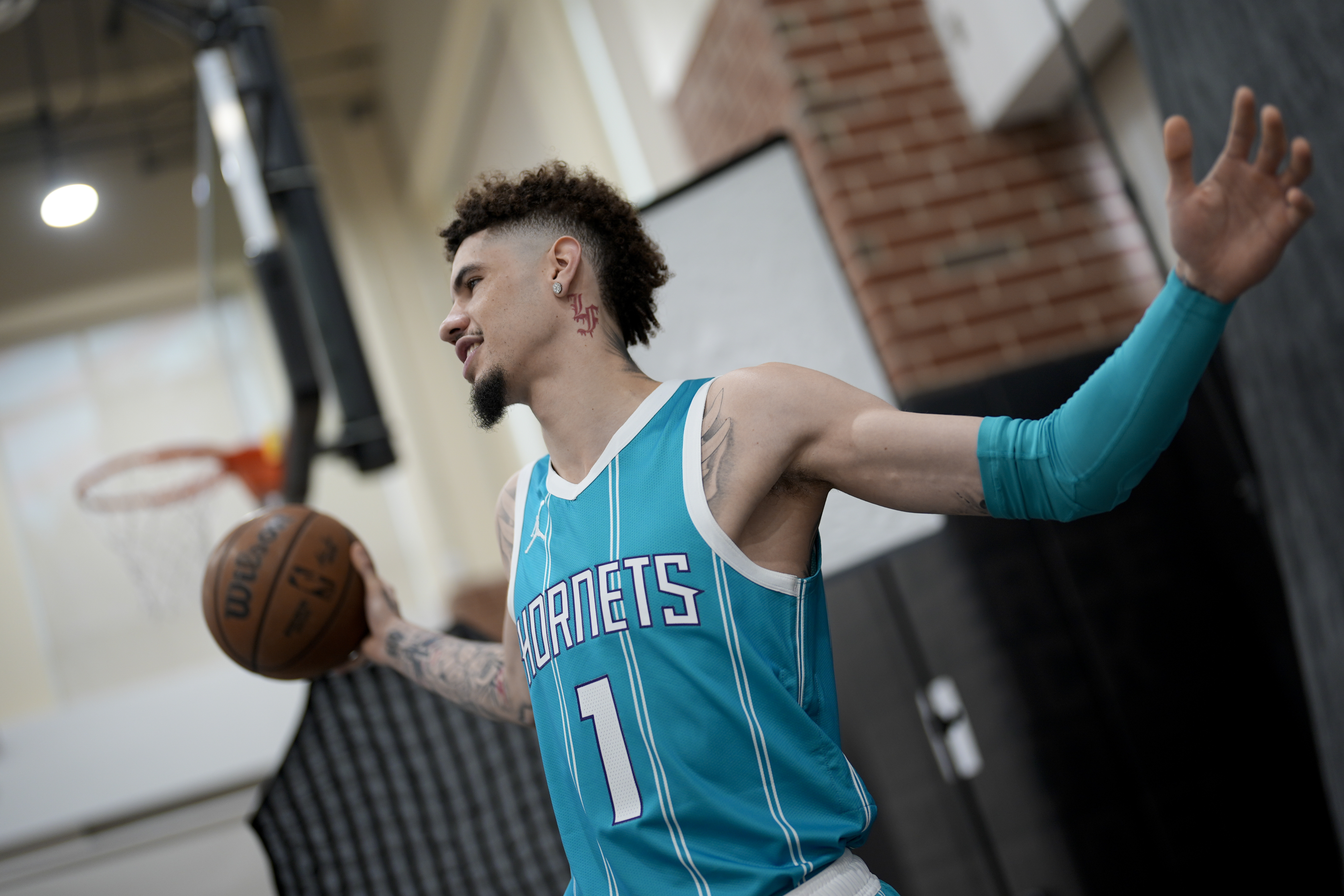 Charlotte Hornets' LaMelo Ball poses during the NBA basketball teams media day, Monday, Sept. 30, 2024, in Charlotte, N.C.