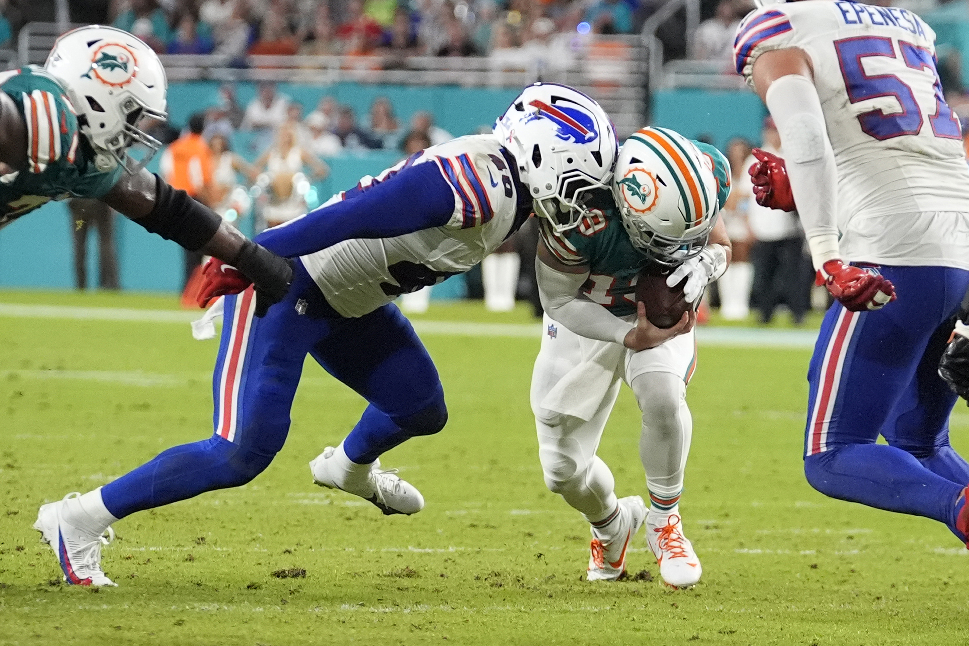 Buffalo Bills linebacker Von Miller (40) sacks Miami Dolphins quarterback Skylar Thompson (19) during the second half of an NFL football game, Thursday, Sept. 12, 2024, in Miami Gardens, Fla. 