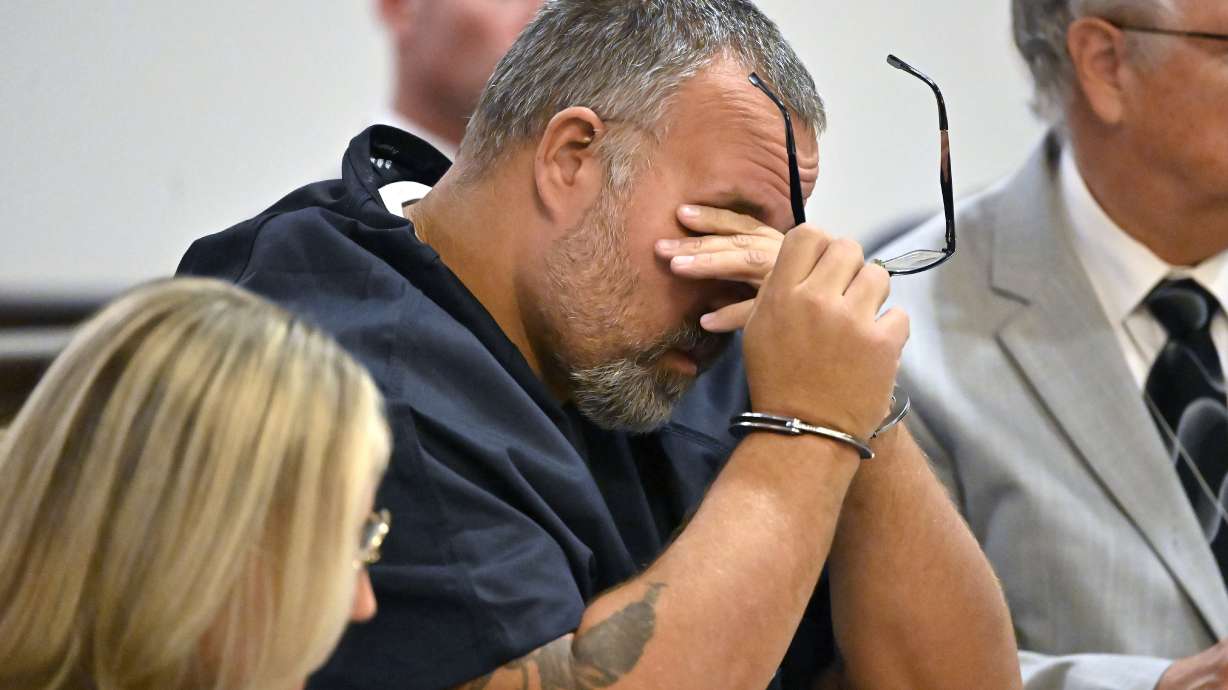 Former Letcher County Ky. Sheriff Shawn "Mickey" Stines wipes his eyes as he listens to testimony during his arraignment at the Morgan County Courthouse in West Liberty, Ky., Tuesday. Stines is accused in the shooting death of Ky. District Judge Kevin Mullins.