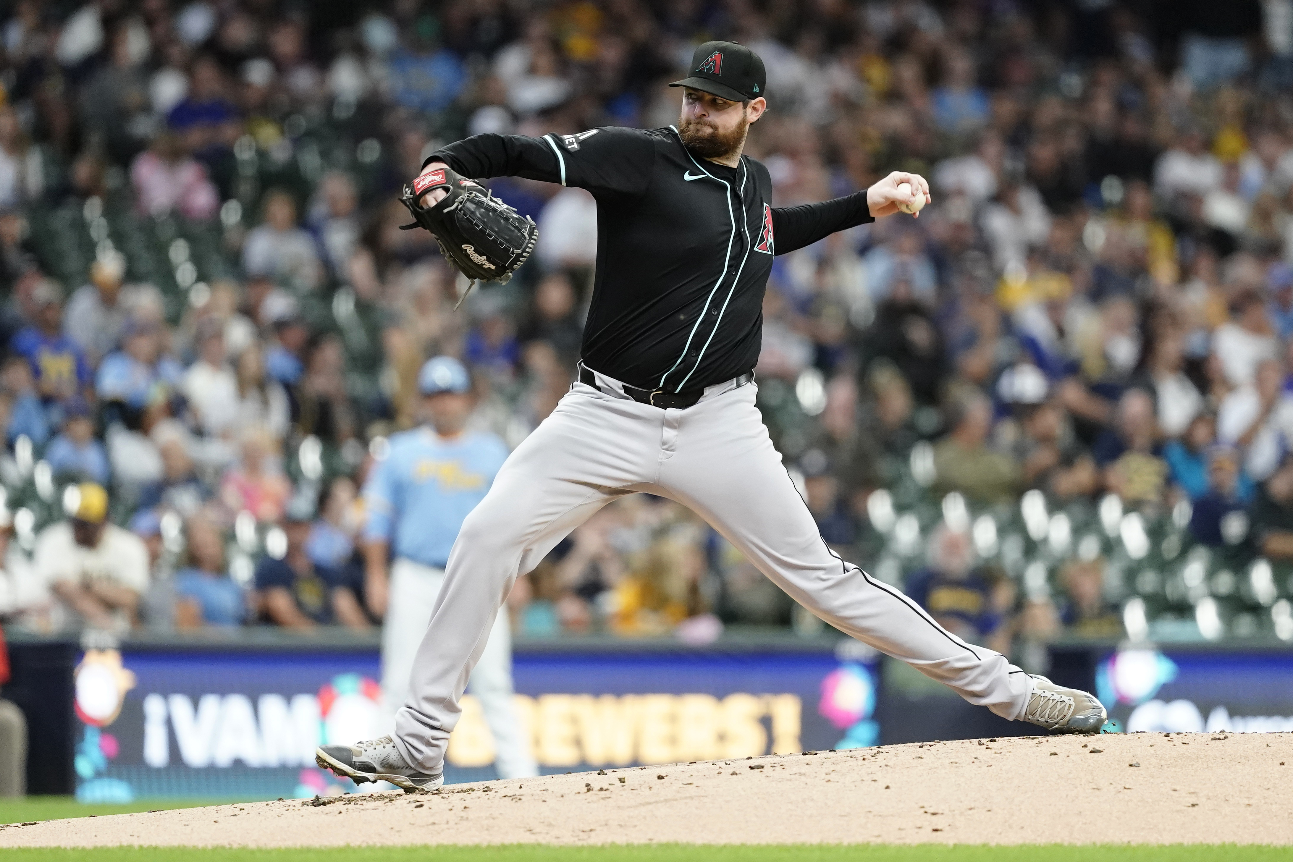 Arizona Diamondbacks' Jordan Montgomery pitches during the first inning of a baseball game against the Milwaukee Brewers, Sunday, Sept. 22, 2024, in Milwaukee. 