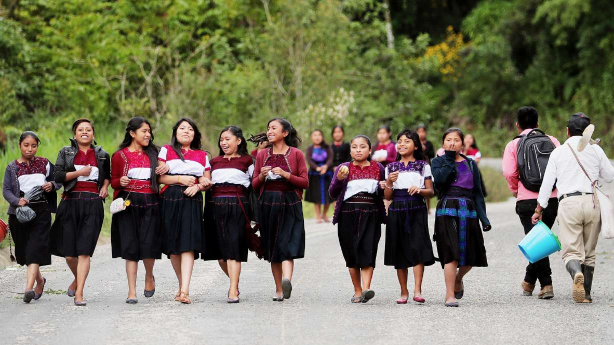 A group of girls walks to San Andres Larrainzar, Mexico, on Nov. 28, 2019. The photo is featured in an exhibit that opens in Salt Lake City on Thursday.