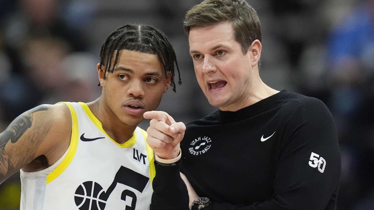 Utah Jazz head coach Will Hardy speaks with guard Keyonte George (3) during the second half of an NBA basketball game against the Golden State Warriors, Thursday, Feb. 15, 2024, in Salt Lake City.
